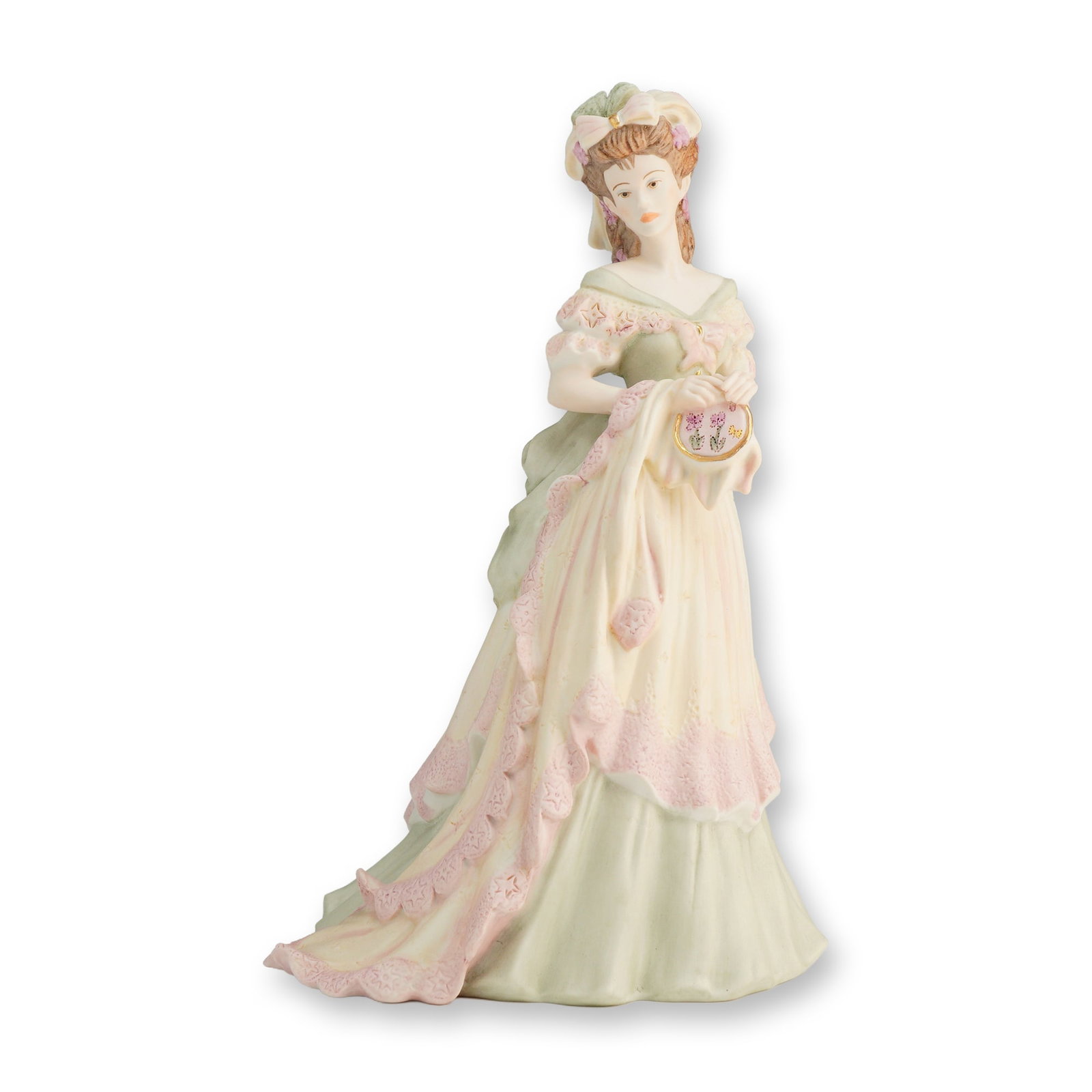 Coalport Porcelain Figurine, Age of Elegance Tapestry: A Coalport matte bisque porcelain figure is modeled in late 18th-century style dress, featuring a tiered gown in pale green and cream tones with pink lace-patterned borders. The subject is depicted ho
