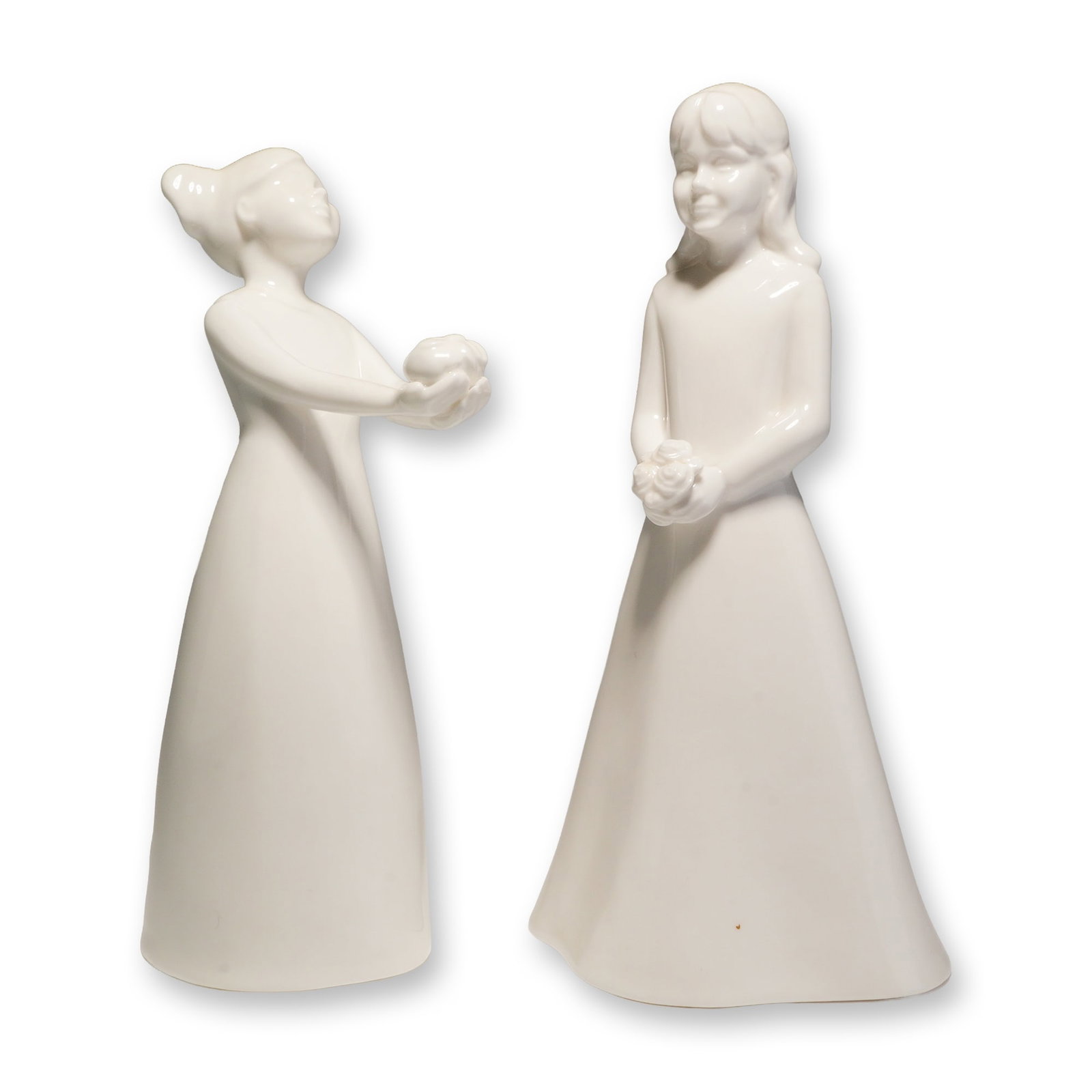 2pc Coalport Moments Bone China Figurines, Special Gift and The Bridesmaid: Two Coalport bone china figurines from the Moments collection. The figurine titled The Special Gift depicts a young girl with hair styled in pig tails holding a gift, with the Coalport mark on the bas