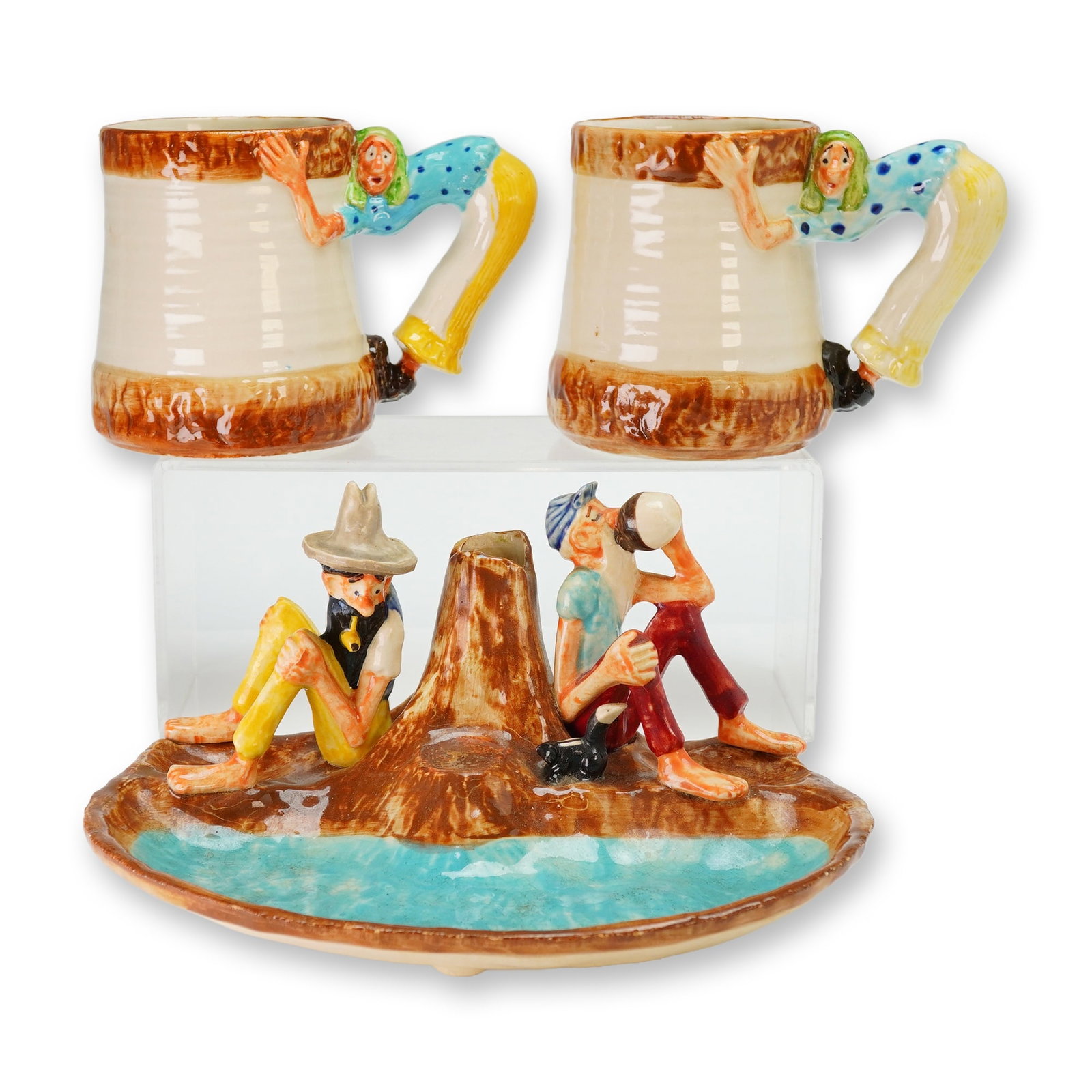3pc Paul Webb Imperial Porcelain Figural Ceramic Set, Mountain Boys: Paul Webb's Mountain Boys comic strip produced circa 1948; the set includes two mugs and a novelty ashtray or dish. The pieces are executed in high-gloss glazed porcelain with hand-painted polychrome 