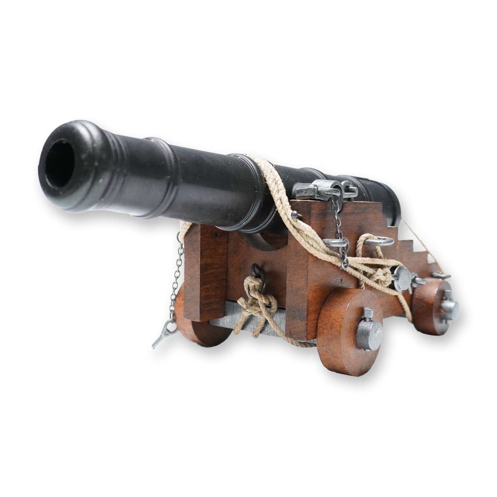 Naval Ship Cannon Model with Wood and Metal Construction: A finely detailed naval deck cannon model, reminiscent of the artillery used aboard historic warships. This beautifully crafted piece features a blackened metal barrel mounted on a sturdy wooden carri