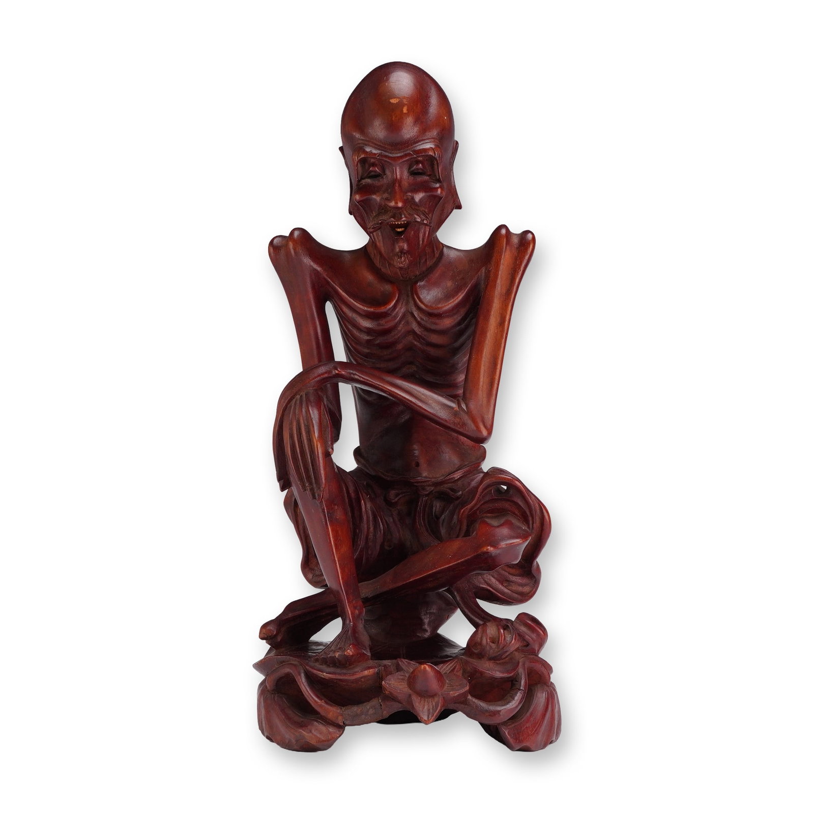 Chinese Emaciated Ascetic Shakyamuni Buddha Hardwood Sculpture: A Chinese hardwood carving, depicting an emaciated male figure. This subject matter represents Shakyamuni Buddha during his six years of extreme asceticism prior to achieving enlightenment, although i