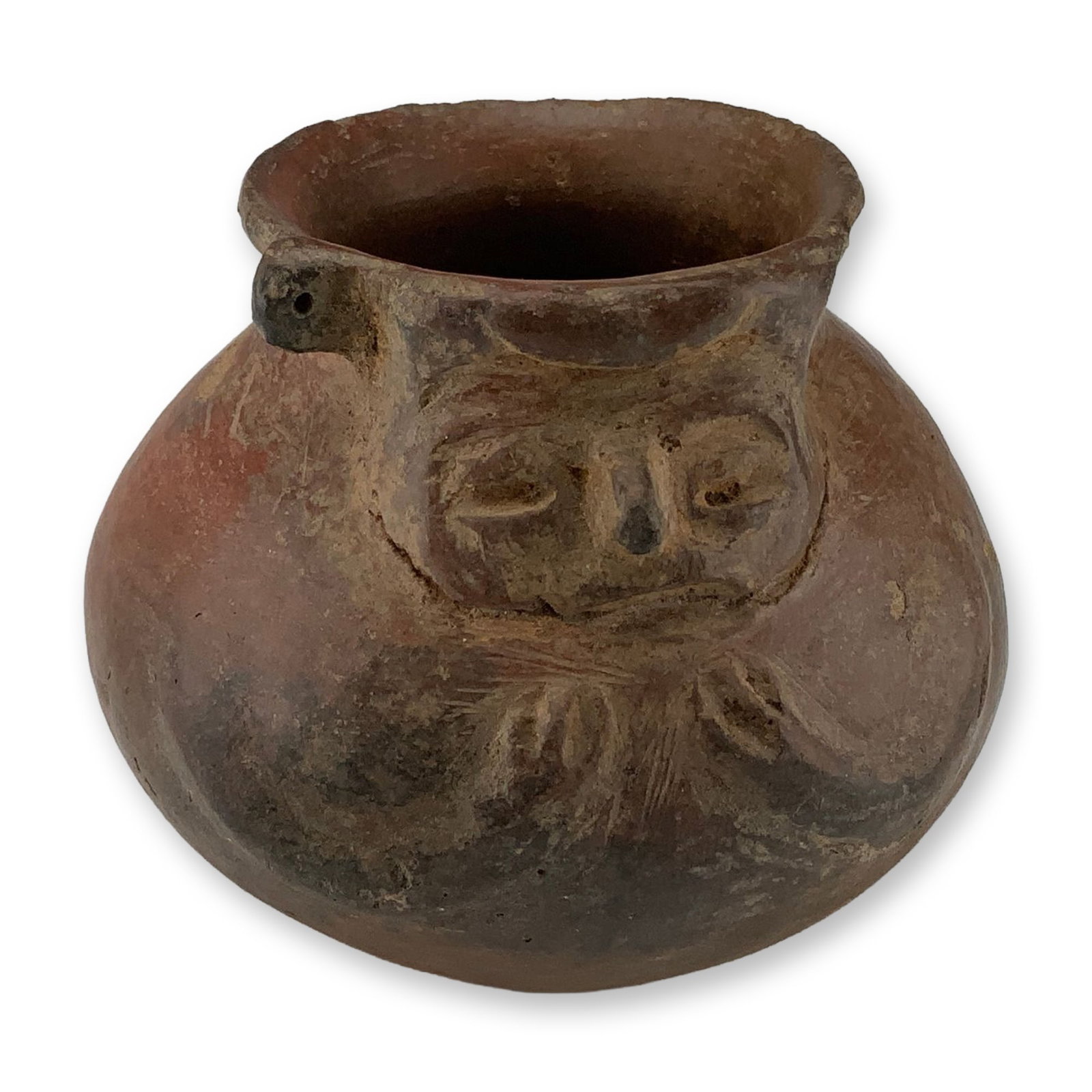 Pre-Columbian Style Ceramic Face-Neck Vessel: This ceramic effigy vessel is an example of Pre-Columbian style pottery. The object is a small face-neck jar, characterized by a stylized human face modeled onto the neck section just below the rim. T
