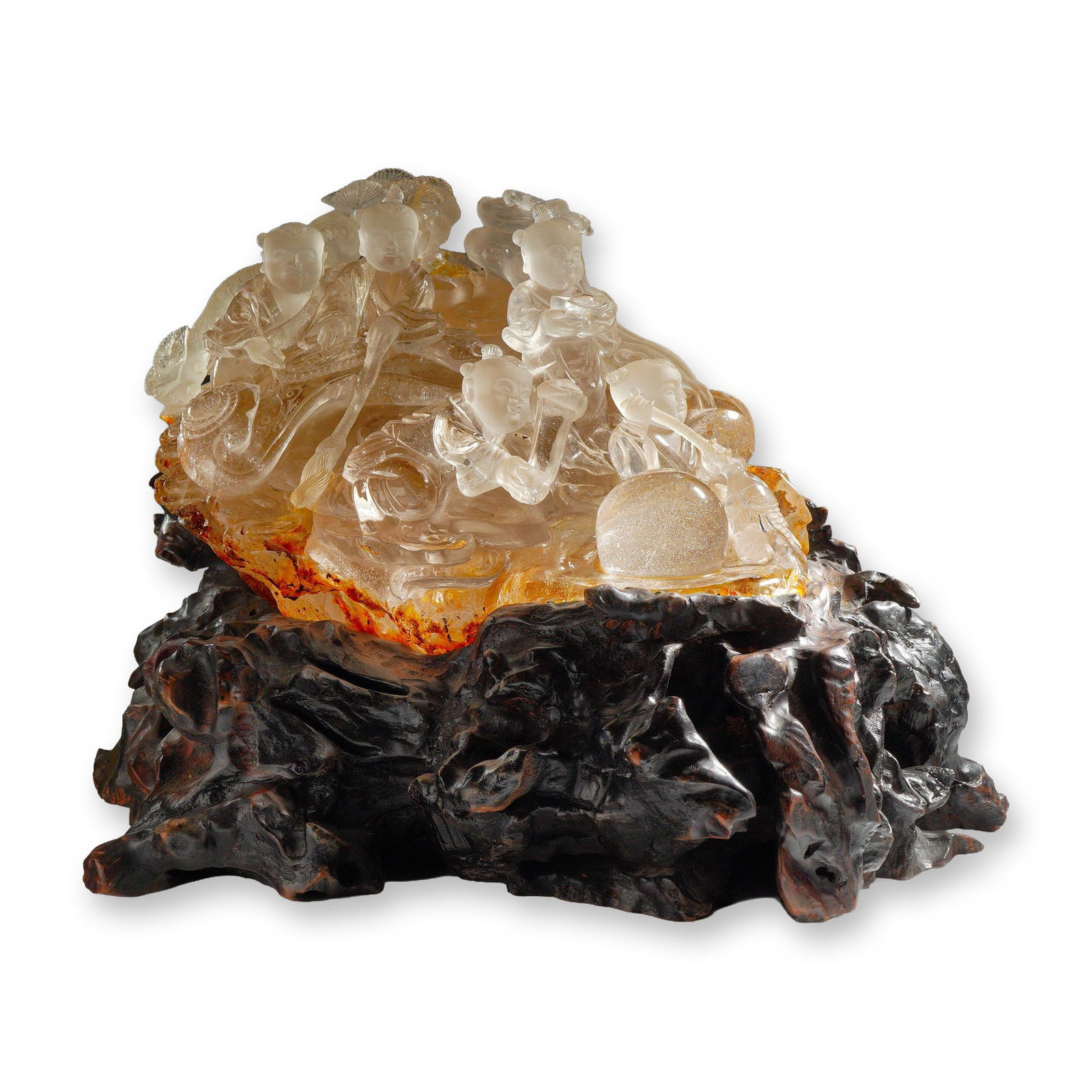 Chinese Large Natural Carved Quartz Crystal Sculpture: This Chinese figural carving is masterfully crafted from a single piece of clear and frosted rock crystal quartz. The composition depicts several boys in traditional attire, each holding auspicious sy