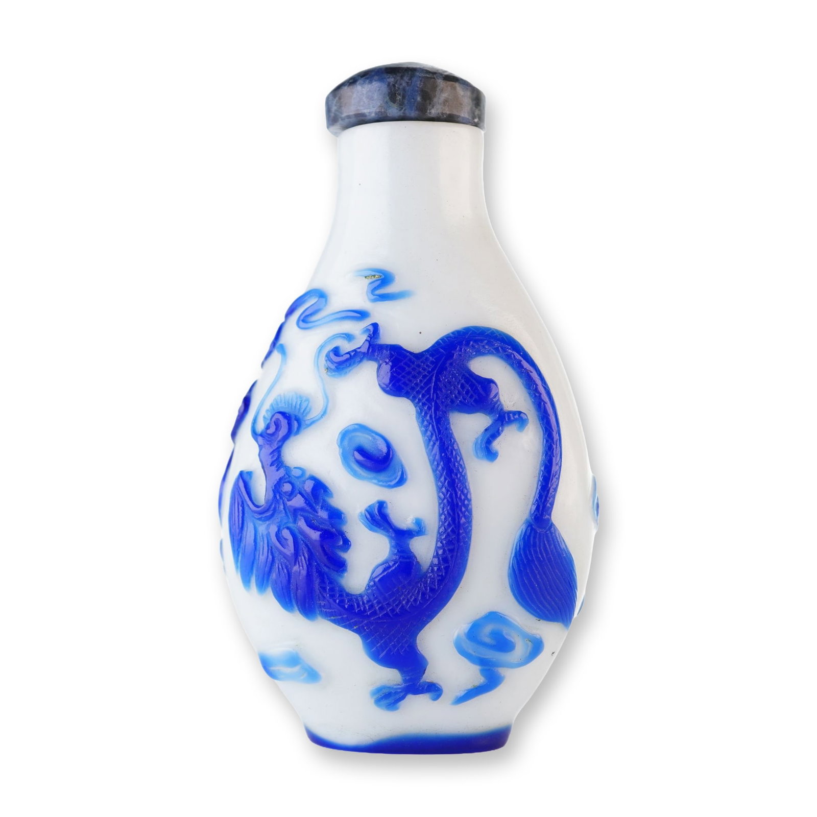 Peking Glass Snuff Bottle, Qilin and Dragon: A white baluster-form Peking glass snuff bottle featuring relief blue overlay depicting a dragon and a Qilin. It is topped with a mottled dark blue stopper. Dimensions: 1.75"L x 1"W x 3"H Weight: 2 oz