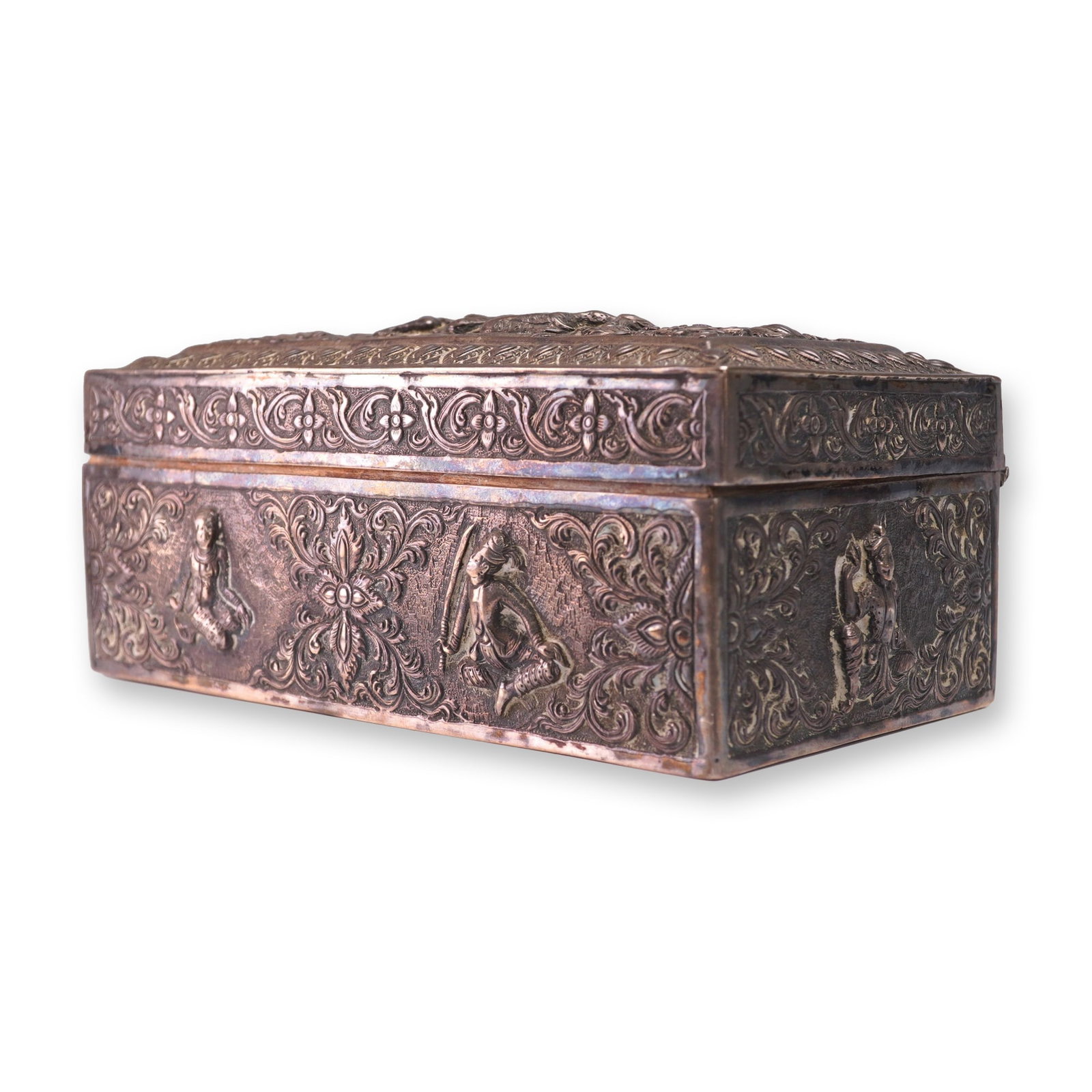 Burmese Figural Repousse Silver Rectangular Box: Burmese figural repousse silver rectangular box with wood inlay. The hinged lid features an embossed panel depicting three figures in traditional attire, surrounded by detailed floral and foliate scro
