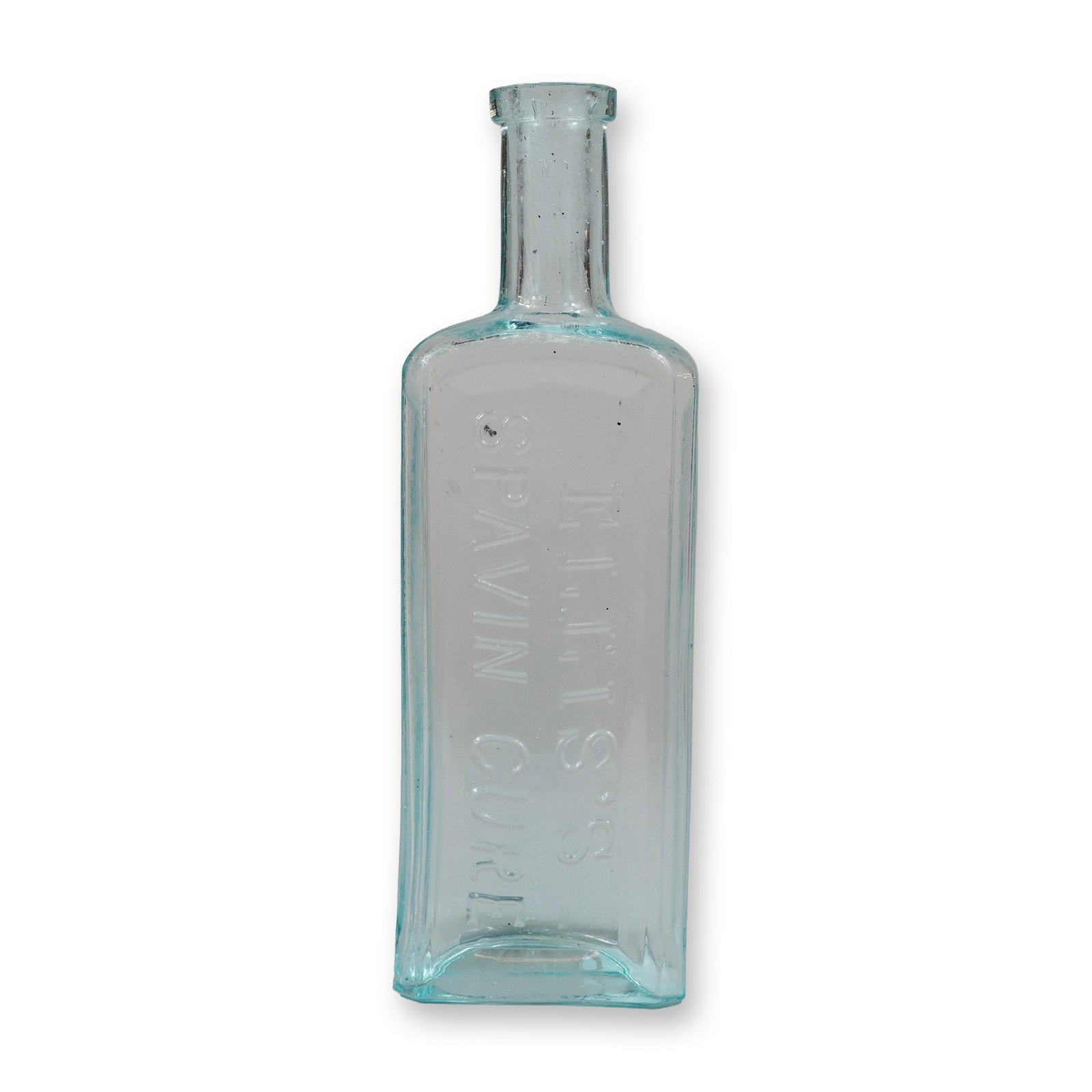 Antique Aqua Glass Ellis's Spavin Cure Medicine Bottle: This antique medicine bottle is constructed from aqua-tinted glass and exhibits characteristics of the blown-in-mold manufacturing process, including visible seed bubbles trapped within the material. 