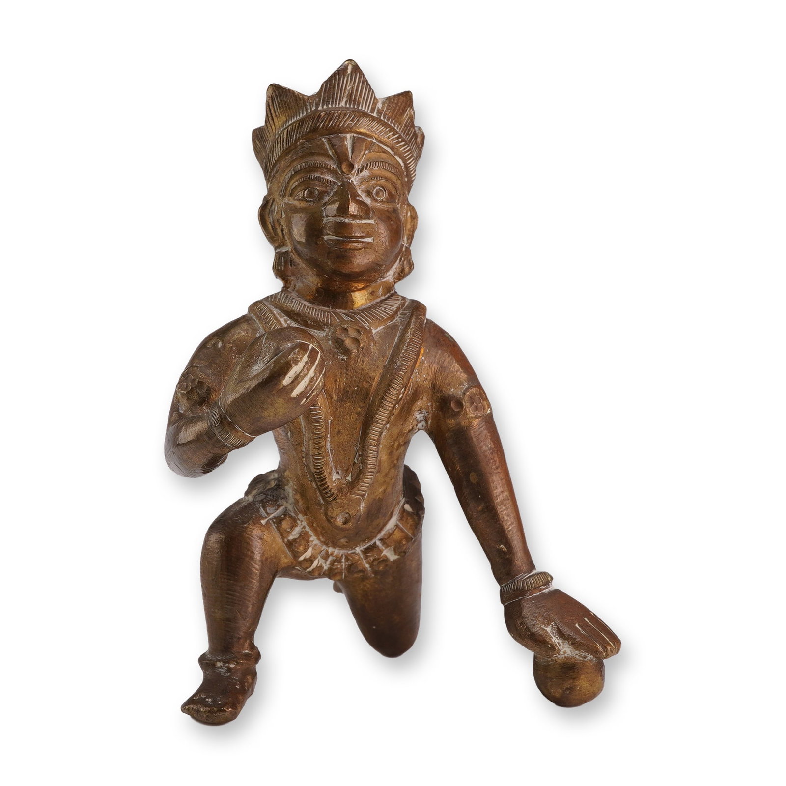 Indian Bronze Figure of Crawling Balakrishna: A gold-tone Indian bronze figure of Balakrishna in a crawling pose with a spherical object in each hand. Dimensions: 3"L x 3.25"W x 4"H Weight: 1.1 lb