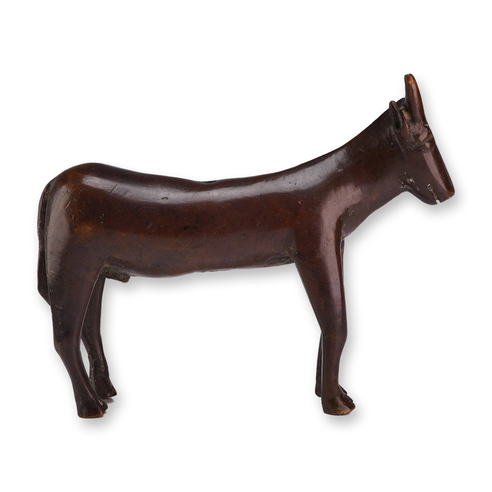 Tibetan Bronze Bull Altar Censer: A Tibetan bronze figurine shaped like a bull, featuring a smooth finish, with a small hole at the top and square opening at the bottom. Dimensions: 6"L x 1"W x 5"H Weight: 2.11 lbs