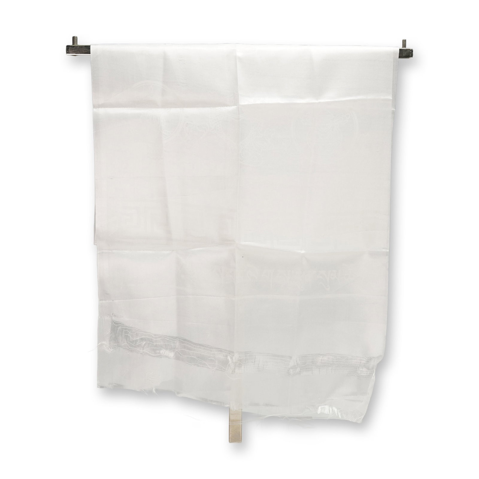 Khata Scarf from the Dalai Lama Visit to FIU September 2004: A traditional white khata scarf presented during the Dalai Lama visit to Florida International University on September 22 2004. The lightweight ceremonial textile has a soft sheen and features woven d