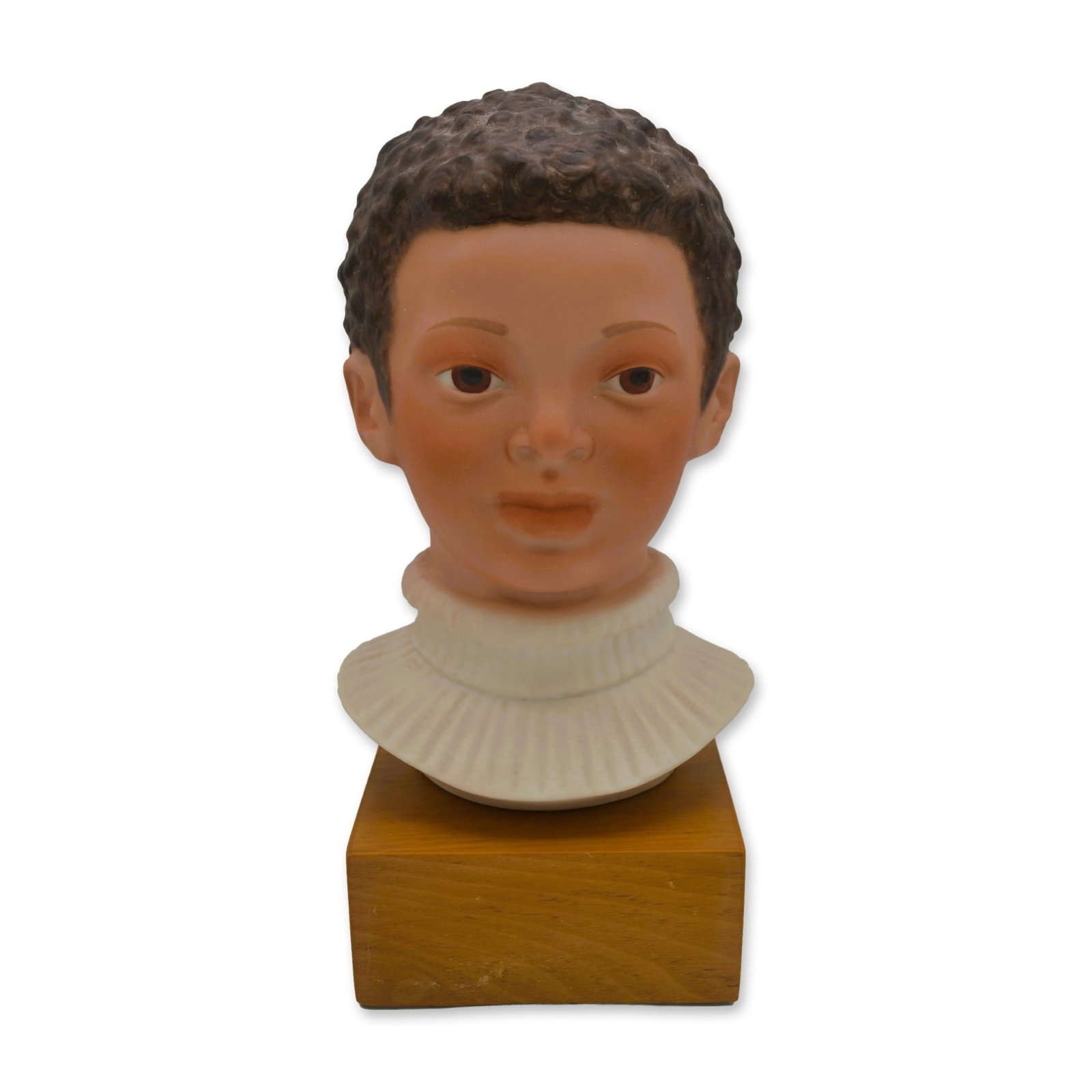 Cybis Porcelain Jason, Child Bust On Wood Base, 1978: Bisque Porcelain Decorated, hand created, hand painted by the Artisans of the Cybis Studios in Trenton, NJ, USA. Featuring the Sculpture of Jason, the Child Head Bust from The Children of the World Co