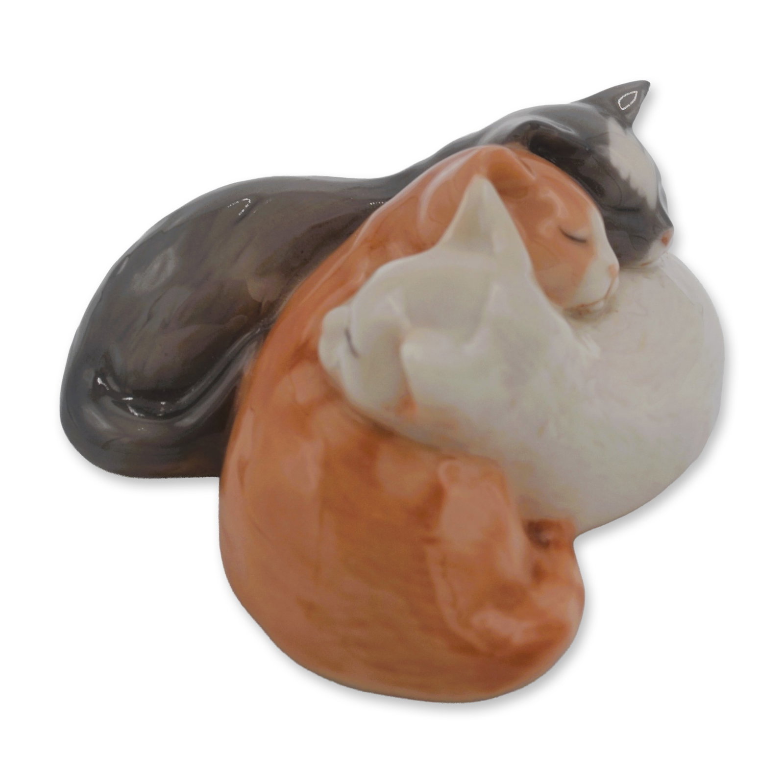 Royal Copenhagen Porcelain Mini Collection Cuddling Cat Trio, # 684, 21st C: The Royal Copenhagen Mini Collection Figurine features a delightful Cuddling Cat Trio, carefully crafted from Fine Porcelain hand made in Denmark. The intricate details of this charming piece make it 