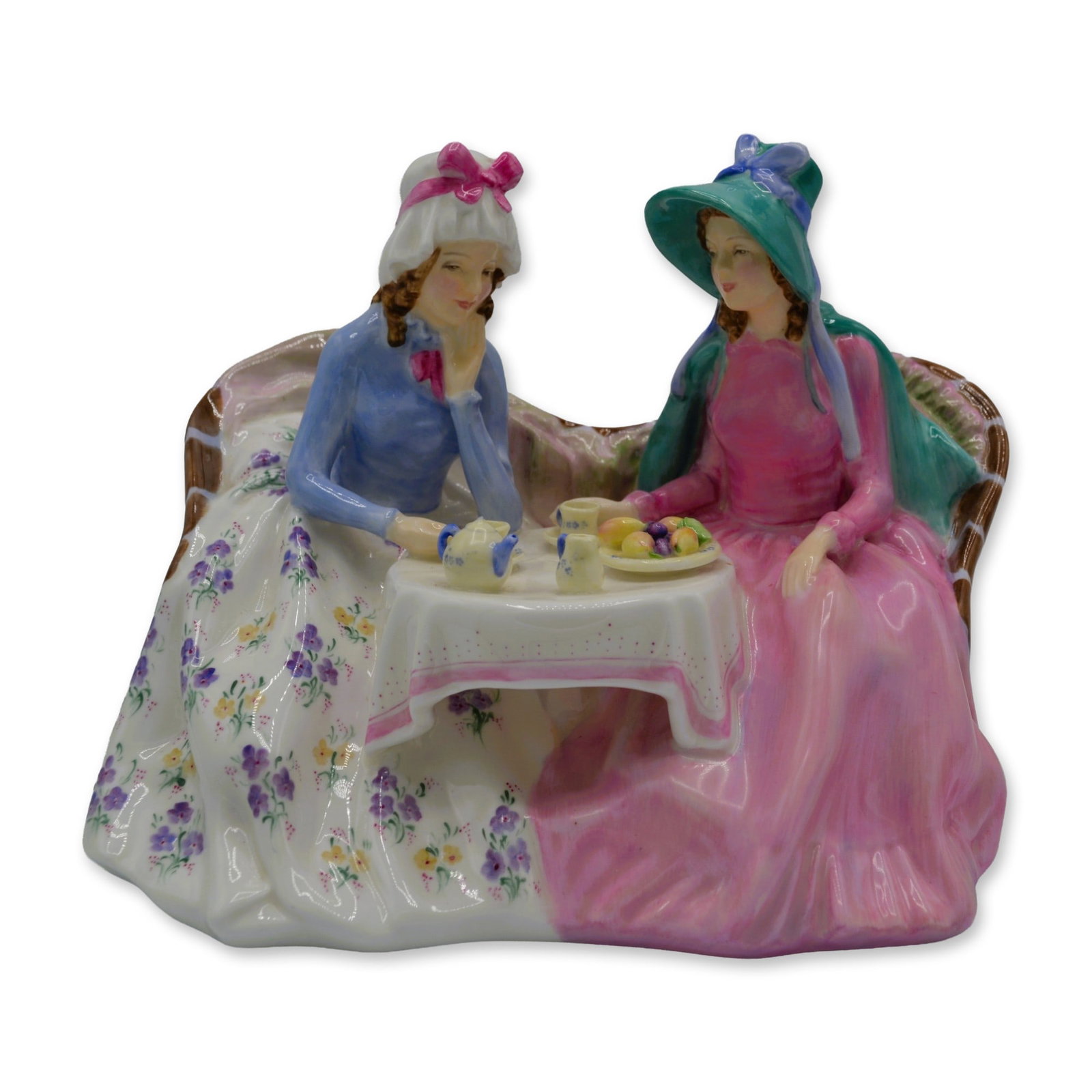 Royal Doulton Porcelain Afternoon Tea, Figurine, HN 1747: Royal Doulton Porcelain "Afternoon Tea," Pink with Lilac Figurine, HN 1747. Featuring Two (2) Ladies seated having their afternoon tea and pastries. Long elegant gowns, one white with lilac florals, a