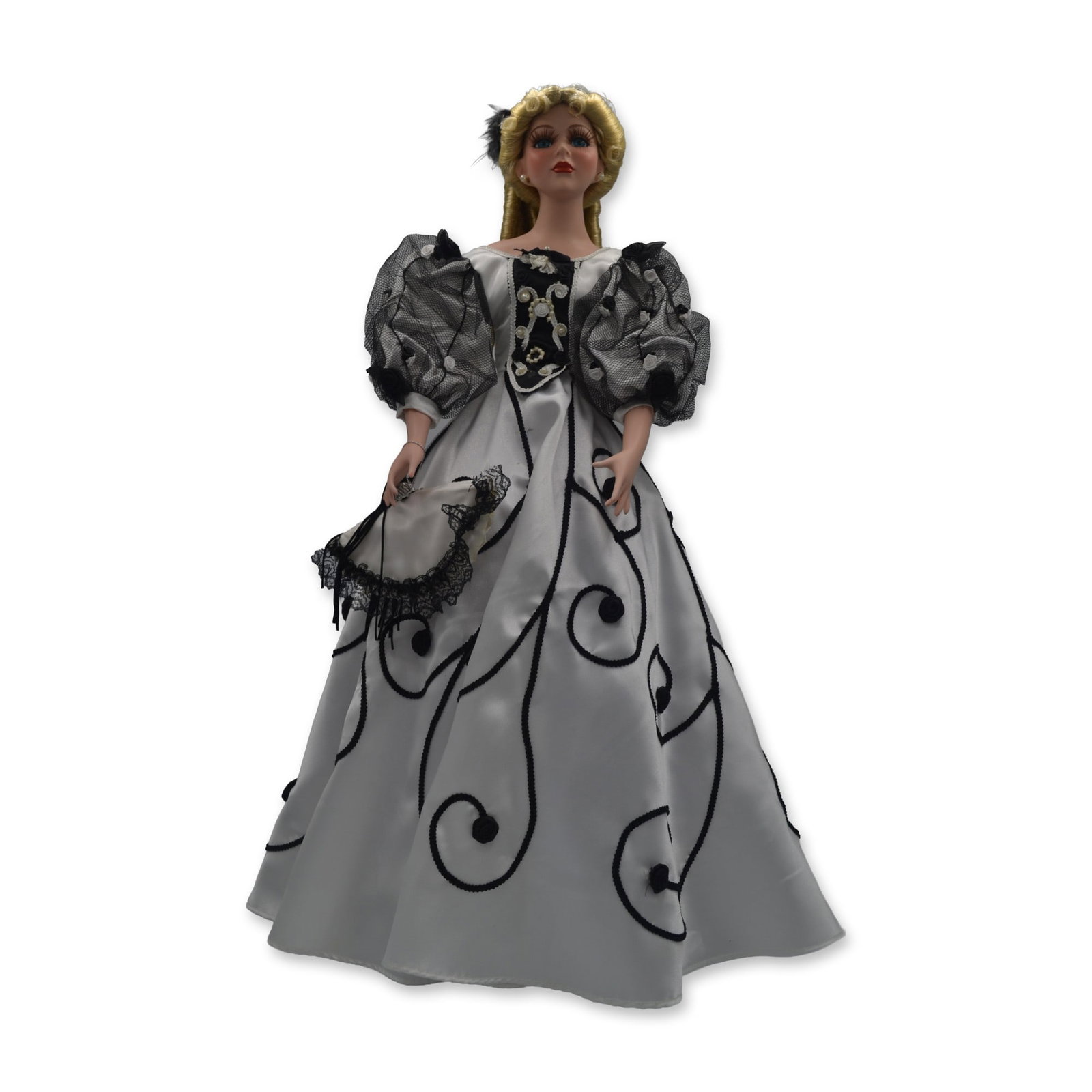 Dynasty Doll Collection Presents LE Porcelain Bride Doll W/Stand, 23"H: Dynasty Doll Collection Presents the Porcelain Limited Edition Bride Doll. A LE Hand Created, hand painted Dynasty Bride Doll in a White Gown with Black Rose Floral Appliques on the front and back of 