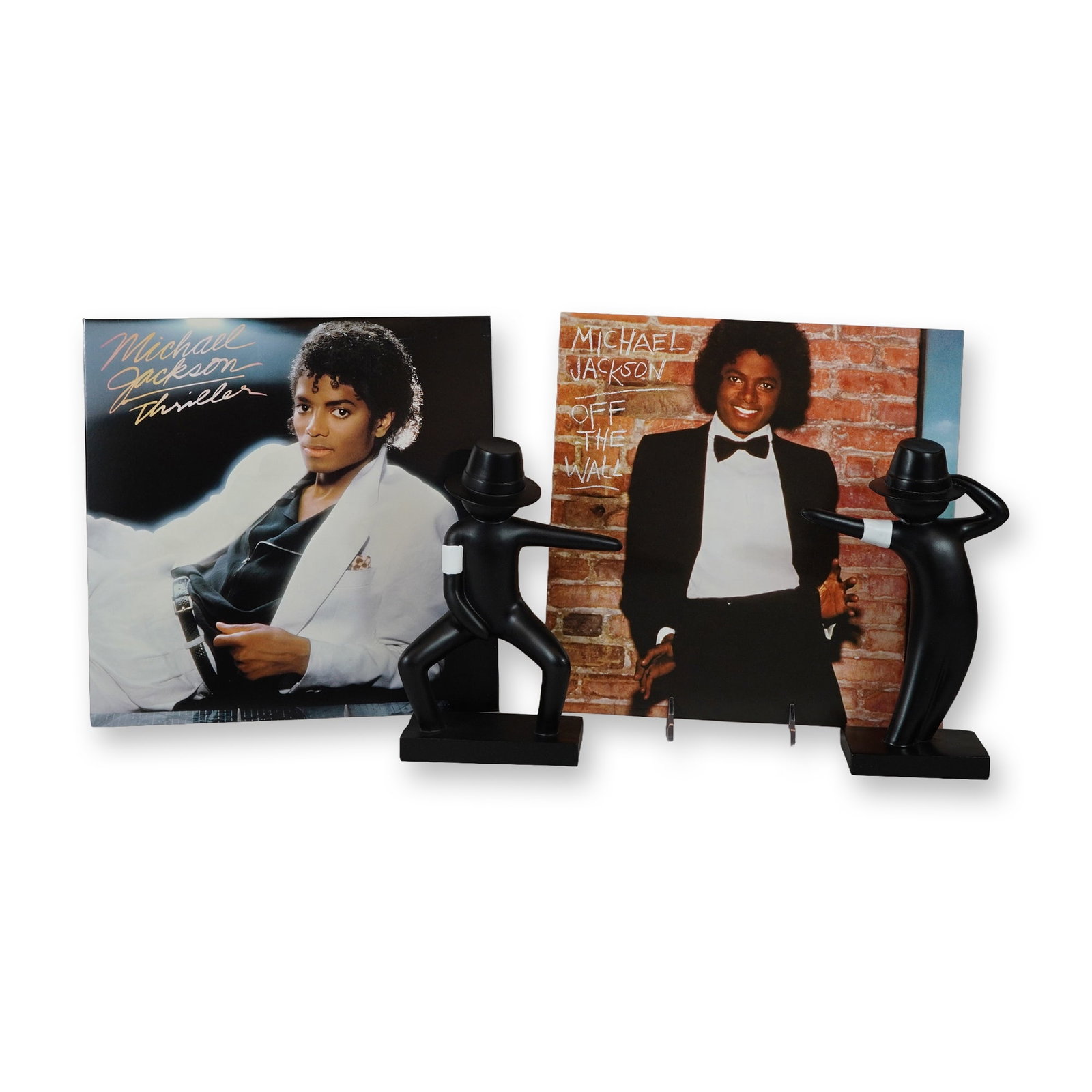 Four-Piece Collection of Michael Jackson LP Vinyls and Figurines (1 of 3)