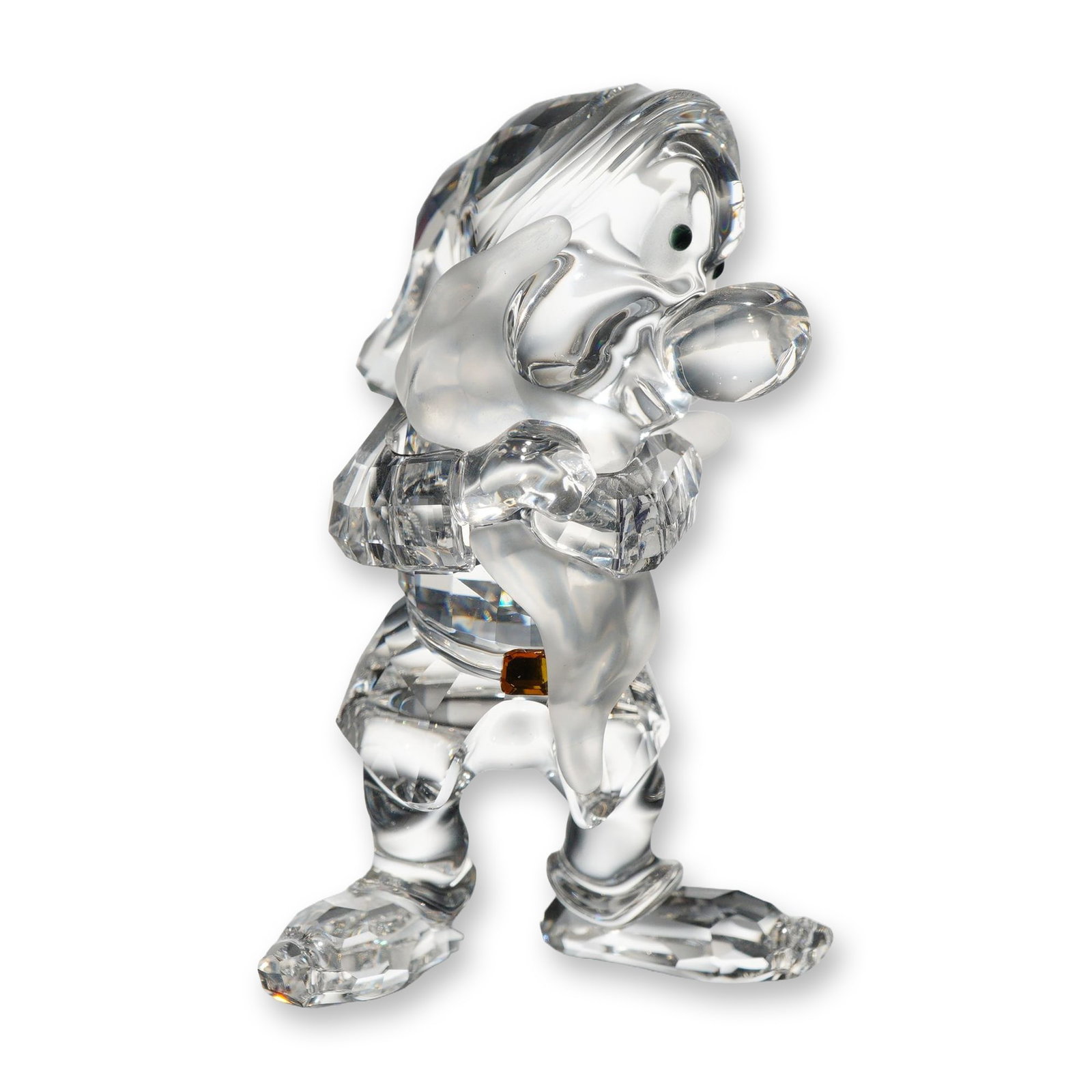 Swarovski Disney Grumpy Snow White Crystal Figurine with Box: Swarovski crystal figurine from the Disney Snow White and the Seven Dwarfs series depicting the character Grumpy. Composed of faceted clear lead crystal with frosted satin finish crystal utilized for 