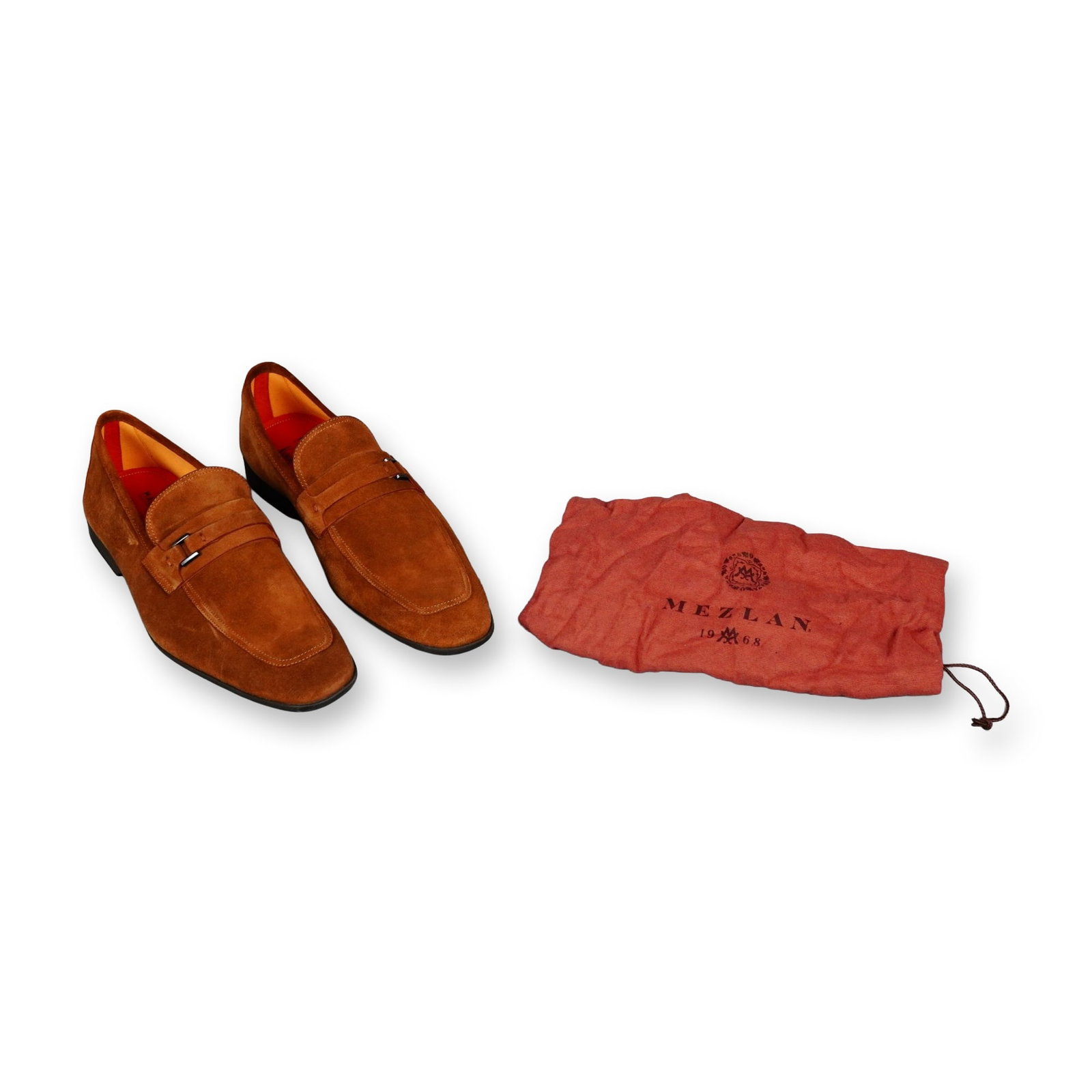 Pair of Magnanni Miengo II Suede Loafers: Pair of Magnanni Miengo II apron-toe loafers in cognac suede leather, made for Neiman Marcus. Features a modern saddle strap with silver-tone bar accents, apron toe stitching, and low block heels. The