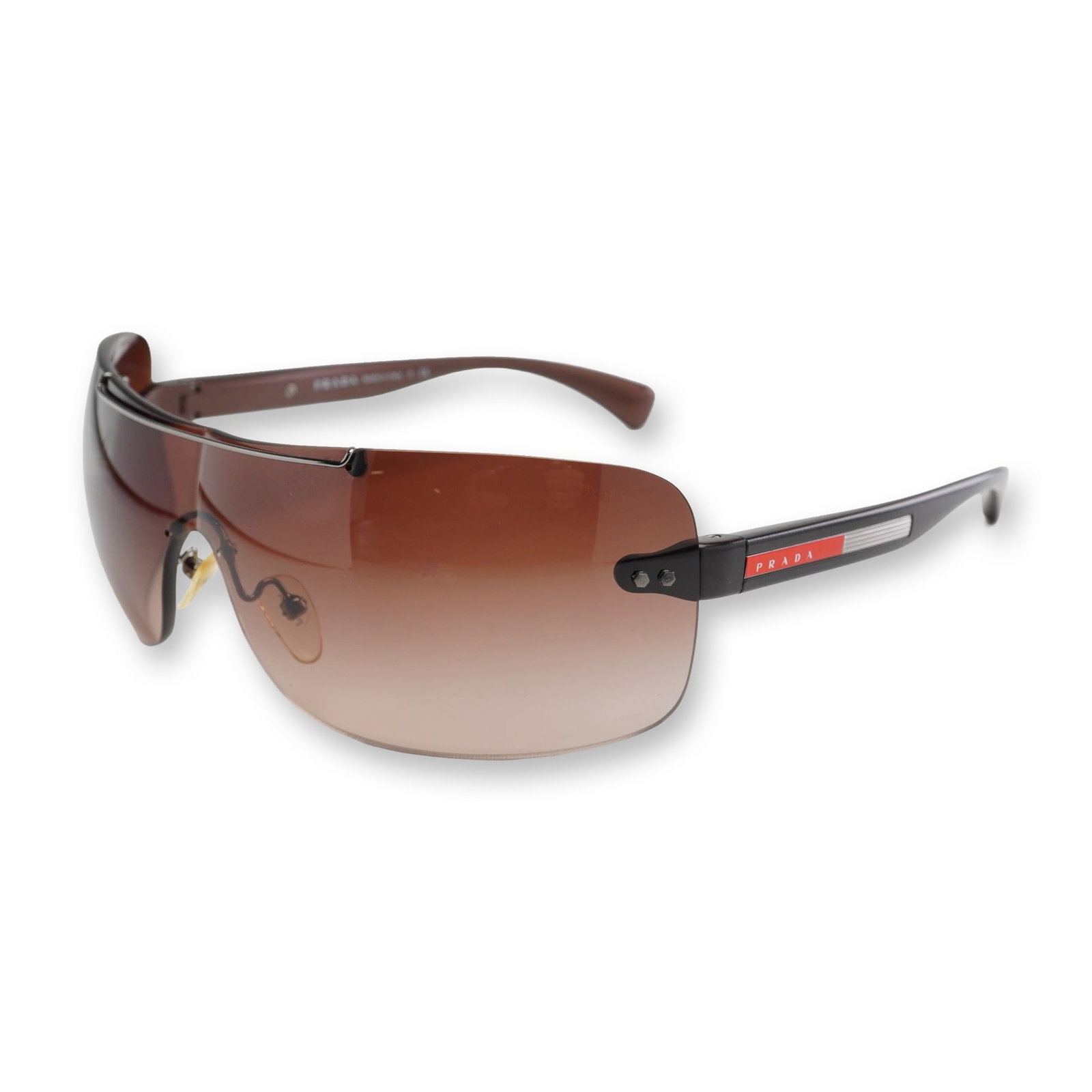 Prada Linea Rossa Shield Wrap Sunglasses with Case: Prada Linea Rossa rimless shield wrap sunglasses, model SPS 02M. Features a brown gradient single-lens shield design with a silver-tone metal brow bar and dark bronze-brown metallic finish acetate tem