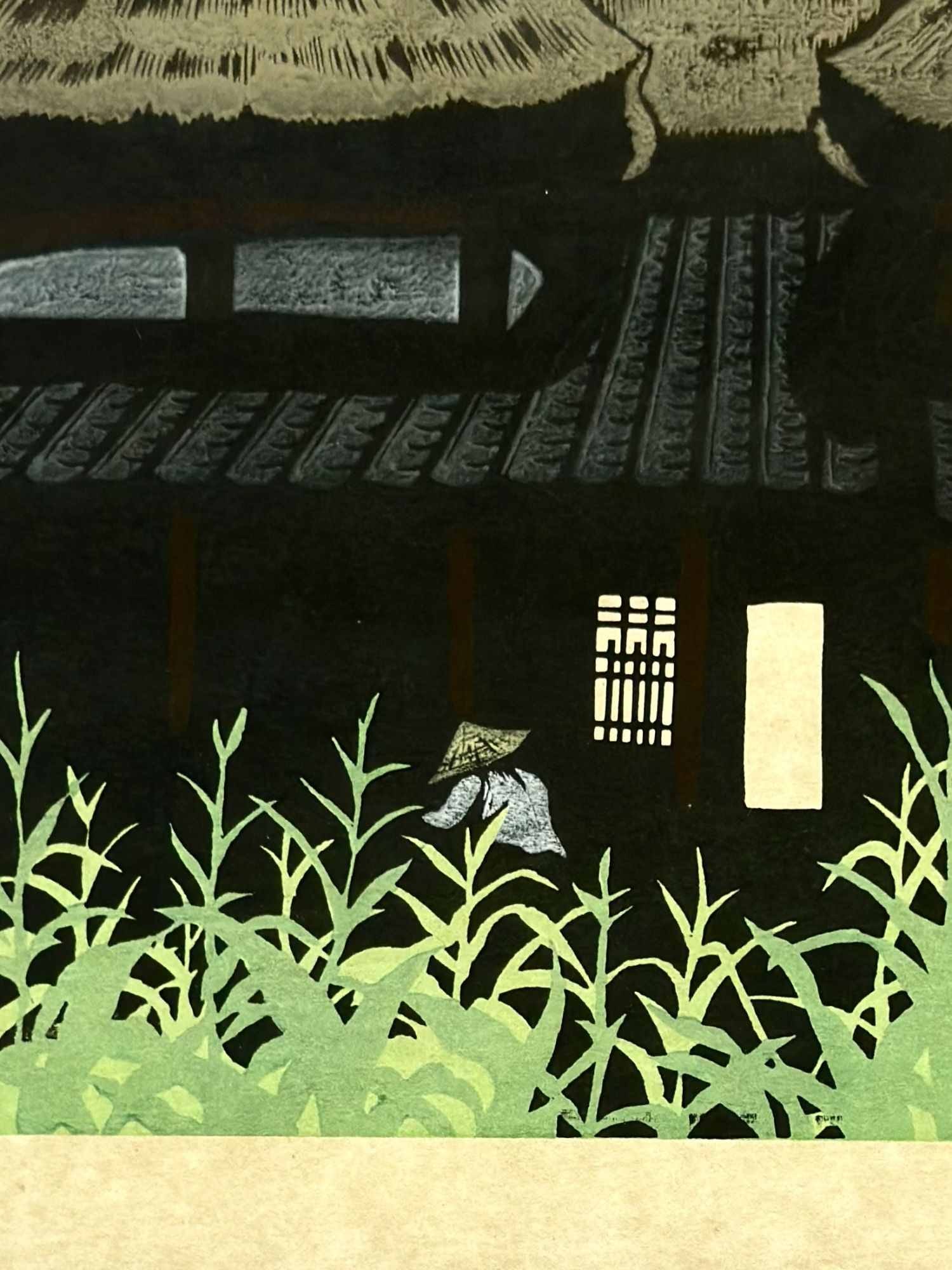 Mitsuhiro Unno (Japanese 1939-1979) Woodcut on Paper, 1975, Signed: This color woodblock print is by the Japanese artist Mitsuhiro Unno (1939-1988), dated August 1975. The subject depicts a figure wearing a traditional conical hat walking through a field of tall green