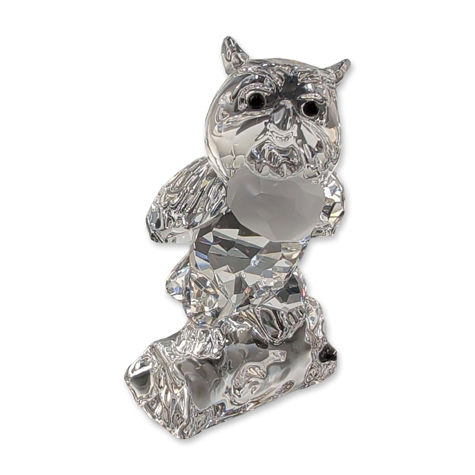 Swarovski Disney Bambi Crystal Figurine, Friend Owl: Swarovski Disney Bambi series Friend Owl figurine in multifaceted clear lead crystal, featuring inset black crystal eyes and a log form base. Laser-etched Swarovski swan hallmark to the underside. Inc