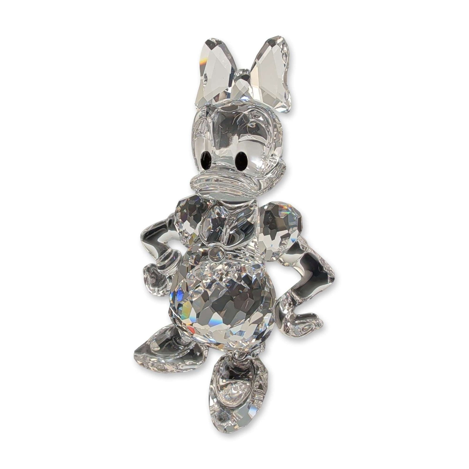 Swarovski Disney Showcase Crystal Figurine, Daisy Duck: Swarovski Disney Showcase Collection Daisy Duck figurine in faceted lead crystal, featuring black crystal eyes. The figure is depicted in a standing pose with hands on hips, detailed with a frosted cr