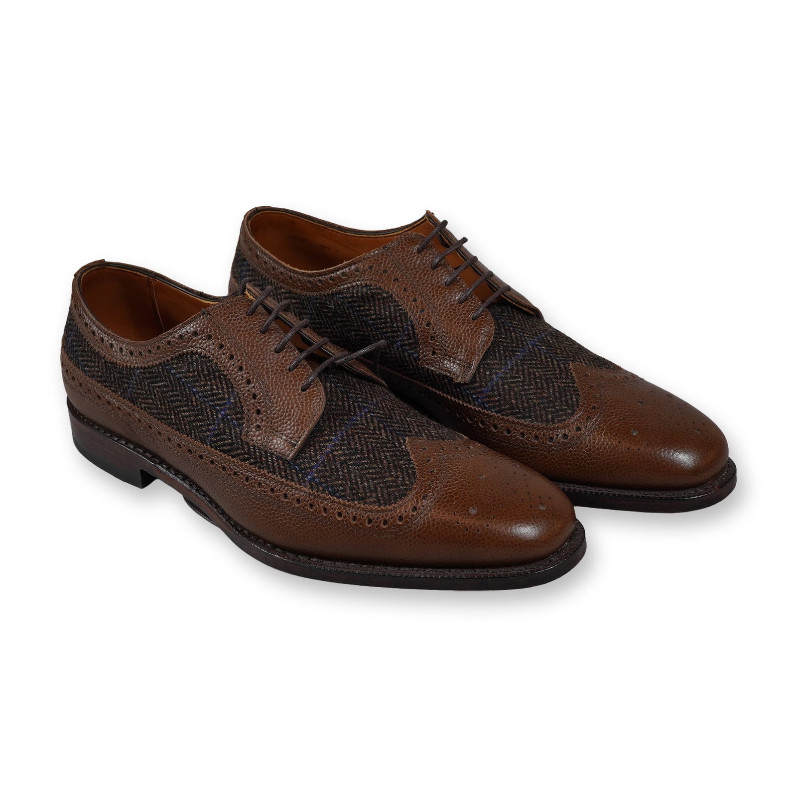 Allen Edmonds Leiden Chili Leather and Fabric Wingtips: This pair of Allen Edmonds Leiden wingtip blucher shoes is made in the USA and features a mixed-media construction of dark chili pebble-grain leather combined with brown and grey herringbone tweed fab