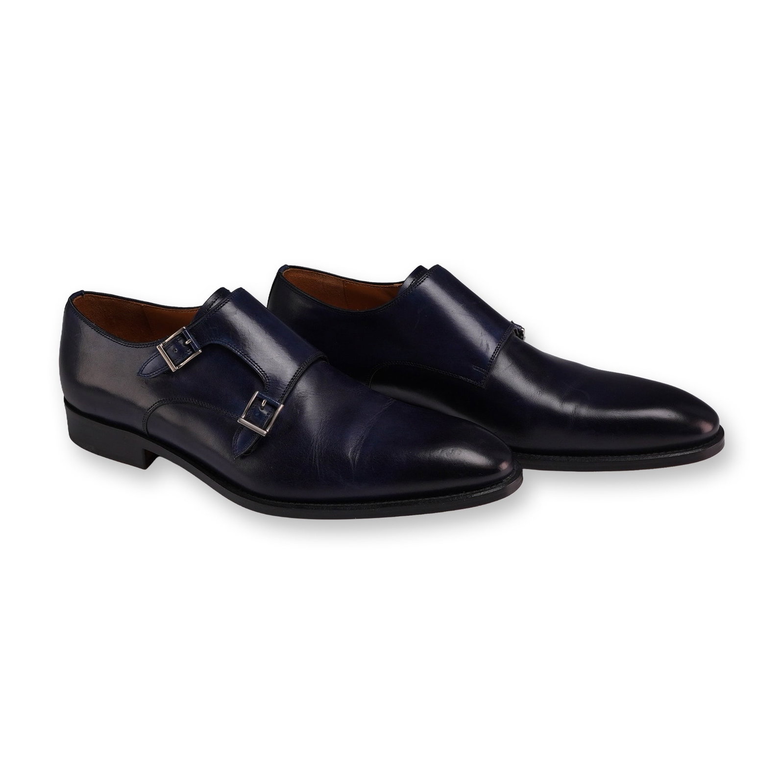 Magnanni for Neiman Marcus Navy Blue Leather Monk Strap Shoes: Magnanni for Neiman Marcus. Pair of men's size 8.5 double monk strap dress shoes in hand-finished navy blue leather with a cap-toe. Features include burnished patina at the toe and heel, silver-tone b