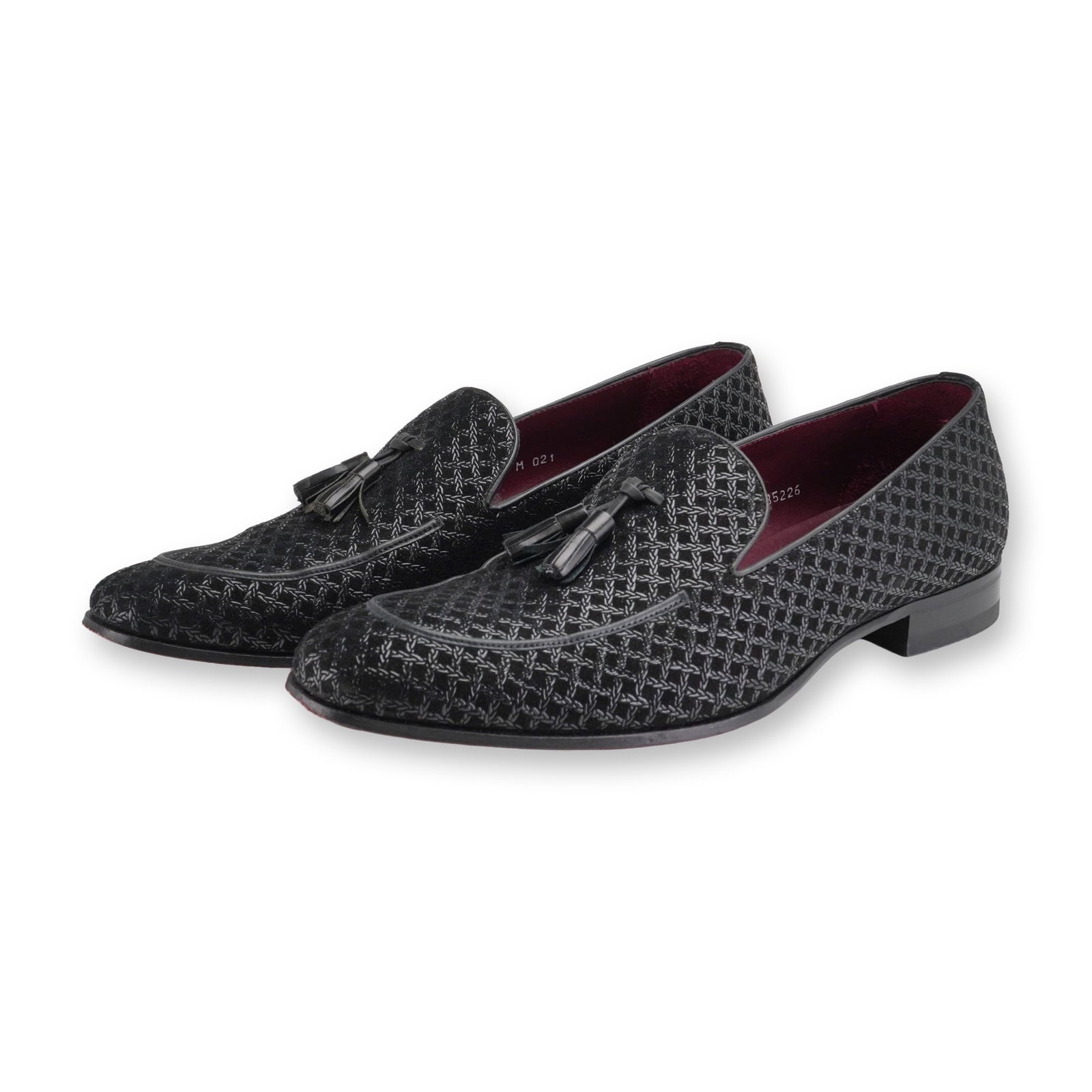 Mezlan Carol Black Embossed Suede Tassel Loafers: Mezlan Carol model men's tassel loafers in black embossed suede, featuring an intricate woven lattice pattern with metallic grey highlights, black leather piping, and twin tassels on the vamp. The con
