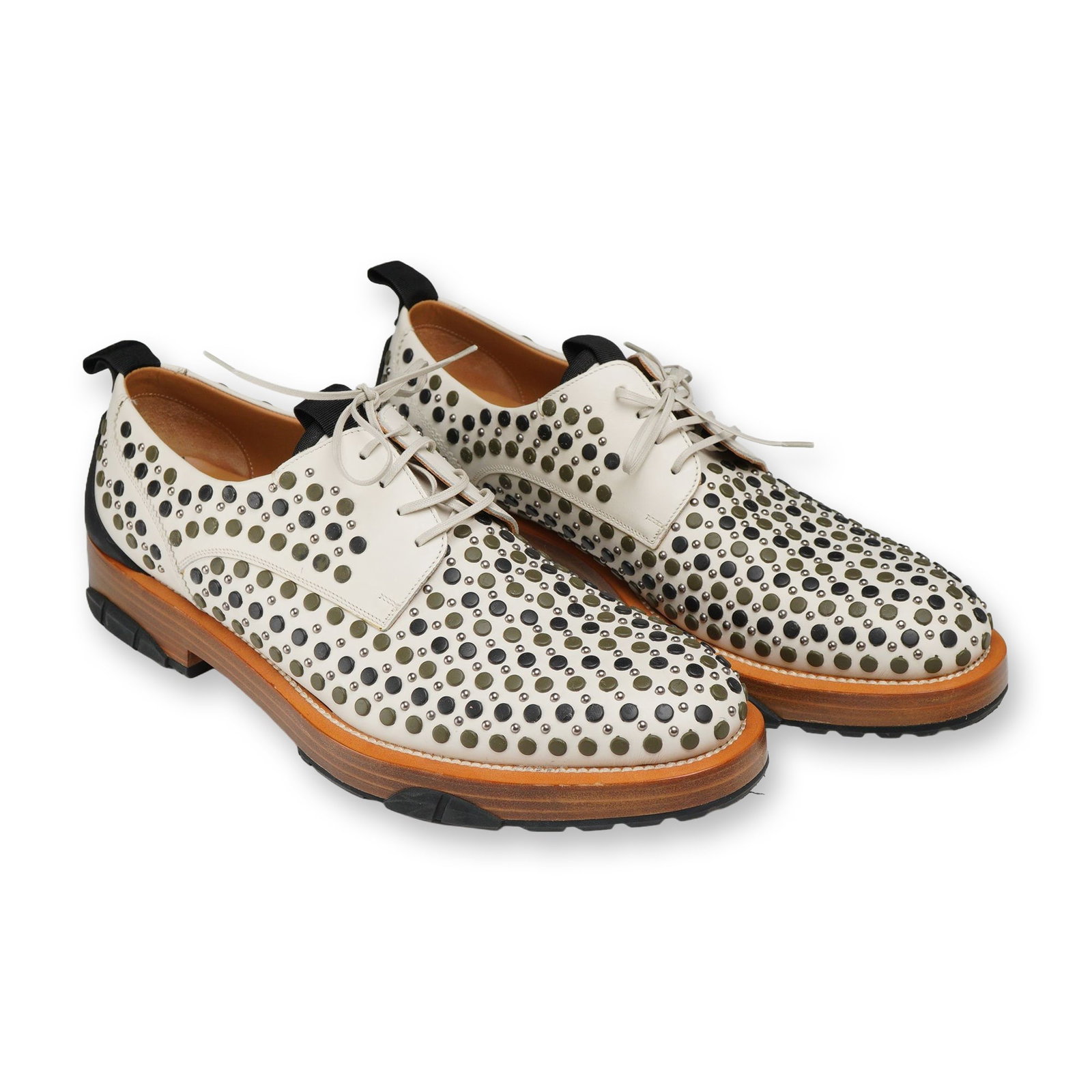 Salvatore Ferragamo Fulgor Studded Leather Derby Shoes: Salvatore Ferragamo Fulgor avant-garde studded derby shoes, featuring white leather uppers heavily embellished with olive green, black, and silver-tone metal and enamel studs. Constructed with stacked