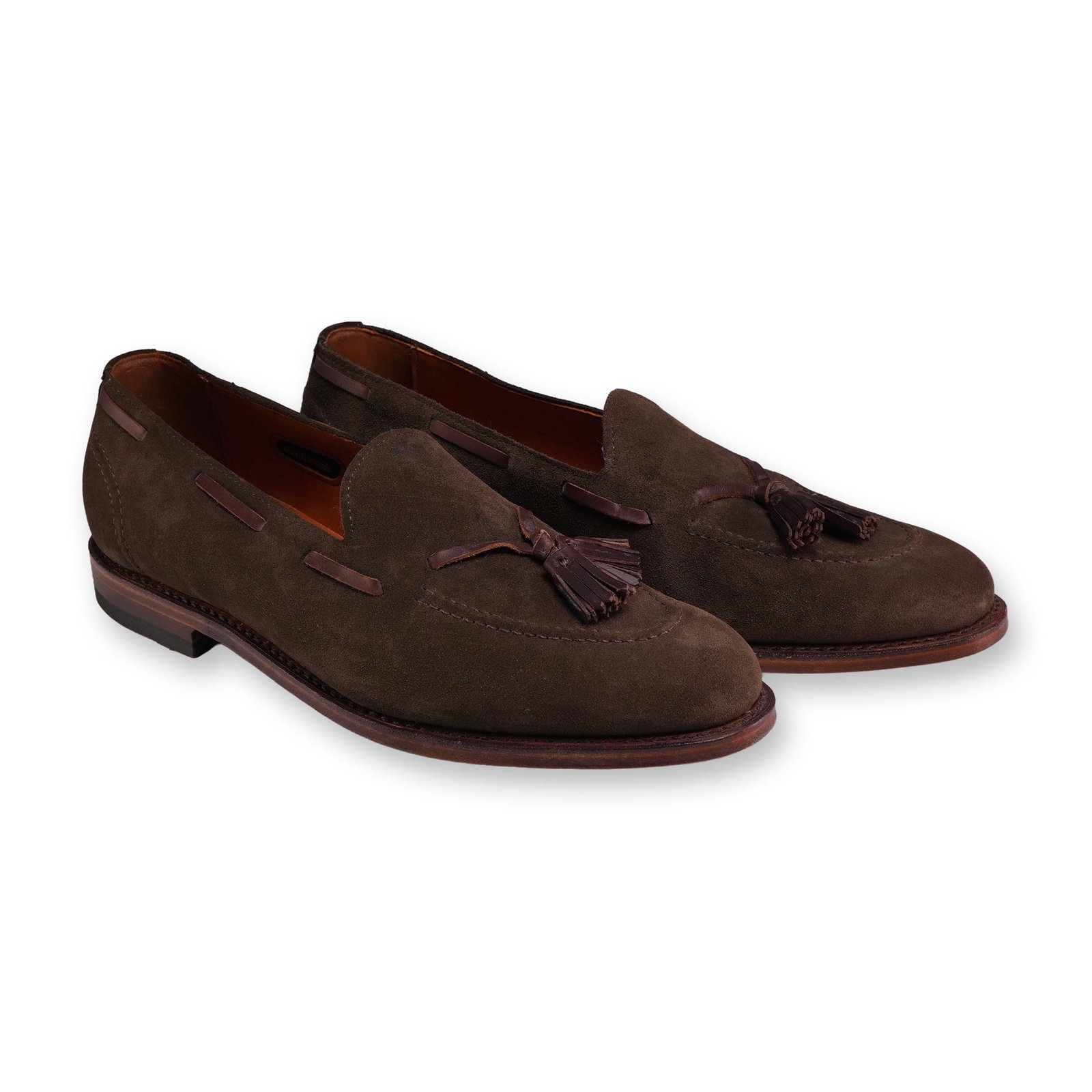 Pair of Allen Edmonds Olive Green Suede Acheson Tassel Loafers: Acheson model tassel loafers in olive green suede, featuring a moc-toe design with decorative leather lacing around the collar and matching leather tassels. Handcrafted in the USA with leather linings