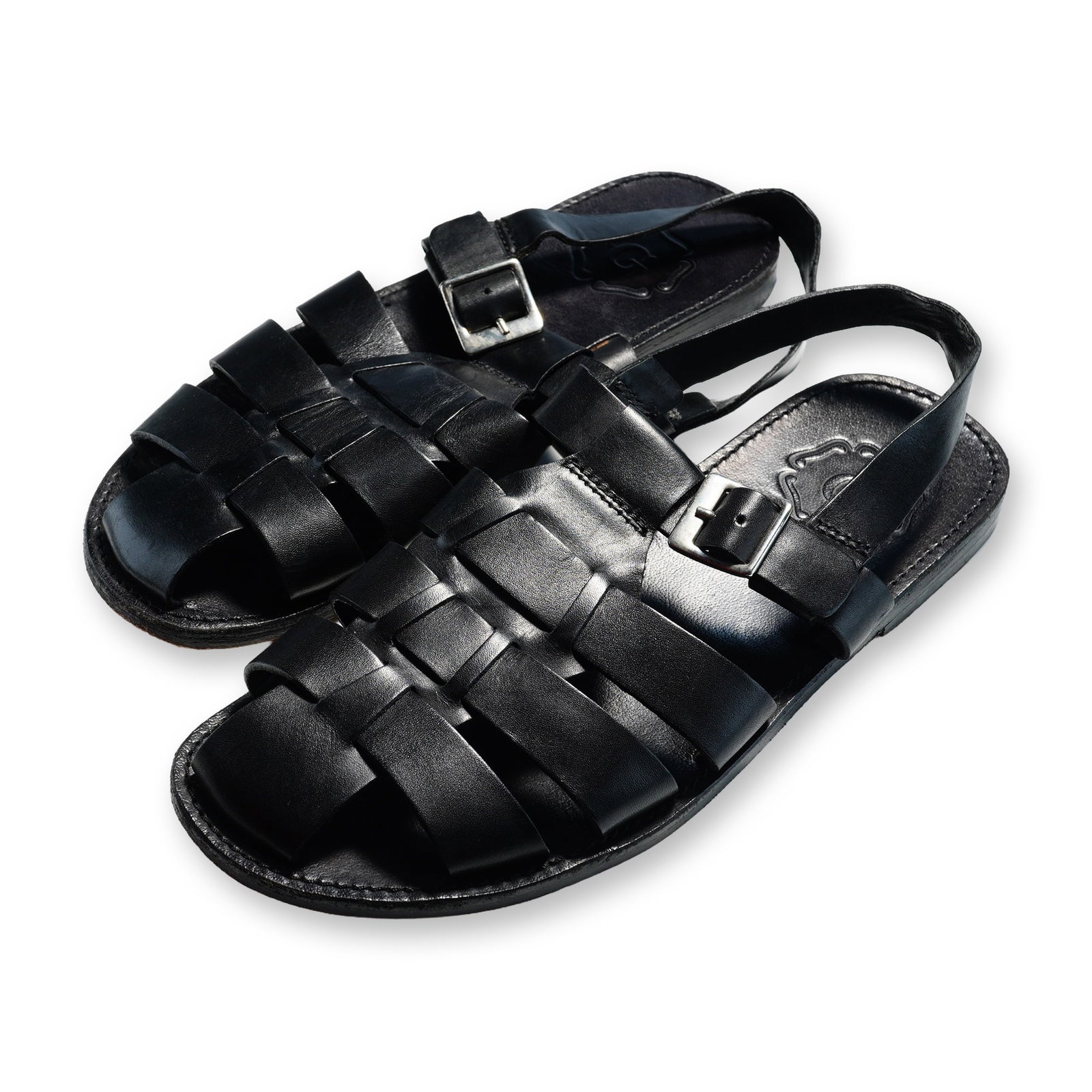 Pair of Grenson Quinton Black Leather Sandals: The Grenson Quinton (also referred to as Quincy) sandals are made with a black 100% leather upper and feature a multi-strap caged design with adjustable buckle fastenings. They have a closed round toe