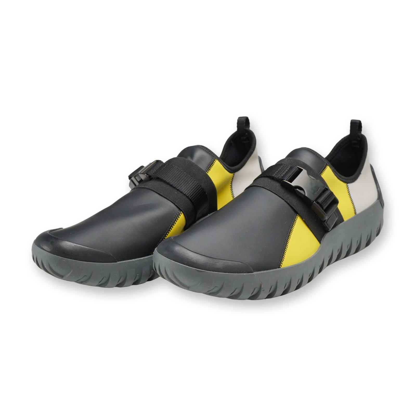 Pair of Prada Neoprene Slip-On Swim Sneakers: Prada. Pair of men's slip-on swim sneakers in black, grey, and yellow neoprene, style 4D3136. Featuring a technical textile upper with zigzag stitched color-blocked panels and the signature red stripe