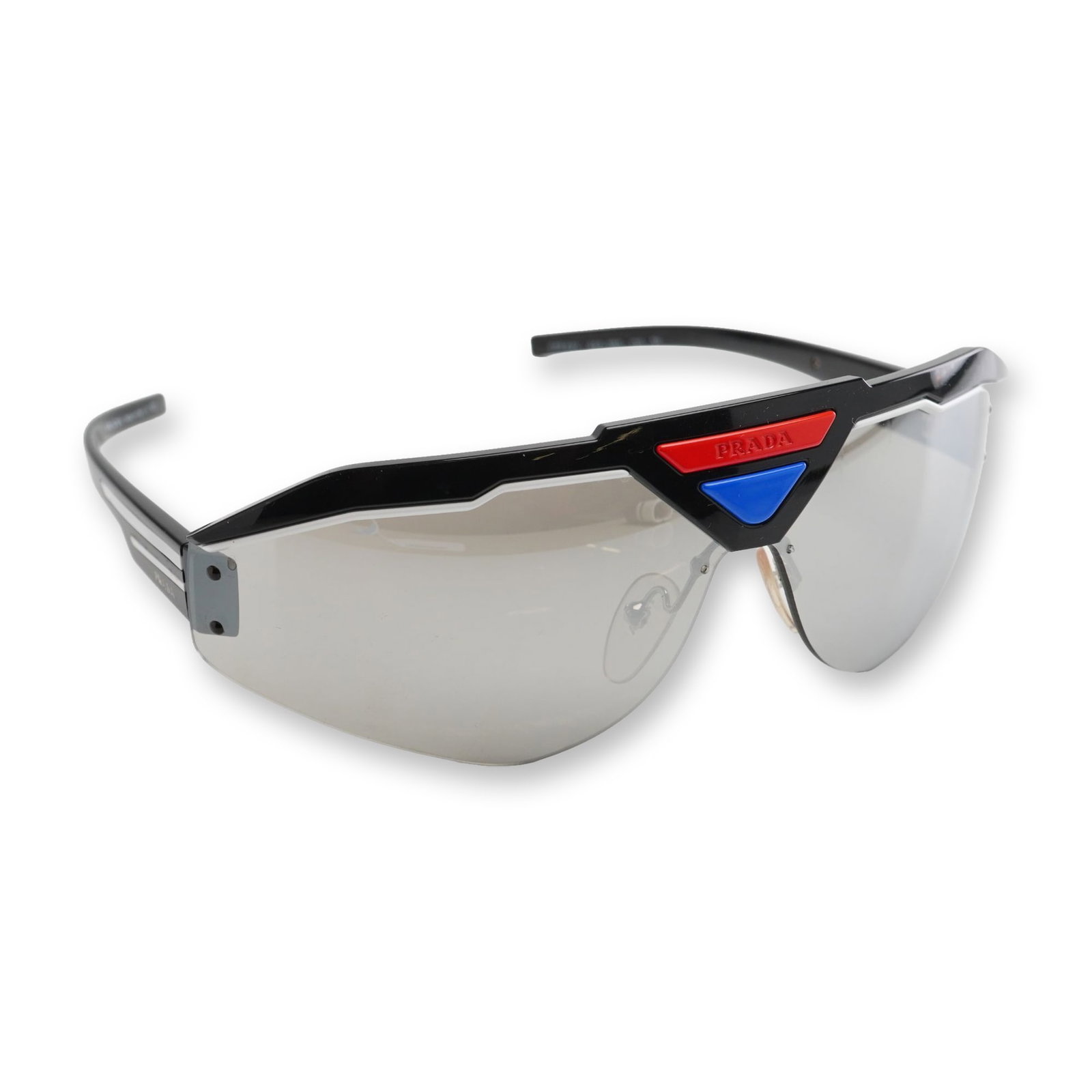 Prada SPR 69V Shield Sunglasses with Case: Prada sport-style shield sunglasses, model SPR 69V, color code 460-2B0. The semi-rimless wrap design features a black acetate brow bar accented with a red trapezoidal geometric emblem bearing the rais