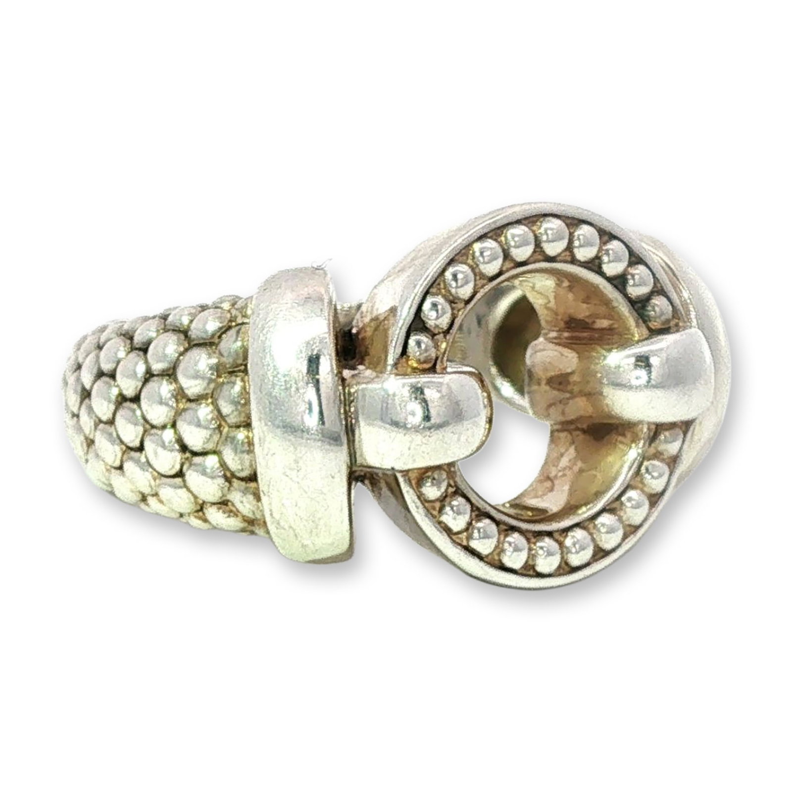 Lagos Sterling Silver Caviar Beaded Interlocking Circle Ring: A sterling silver fashion ring by the American designer Lagos. This piece is characteristic of the designer's Caviar collection, featuring signature beaded metalwork. The wide band is fully textured w