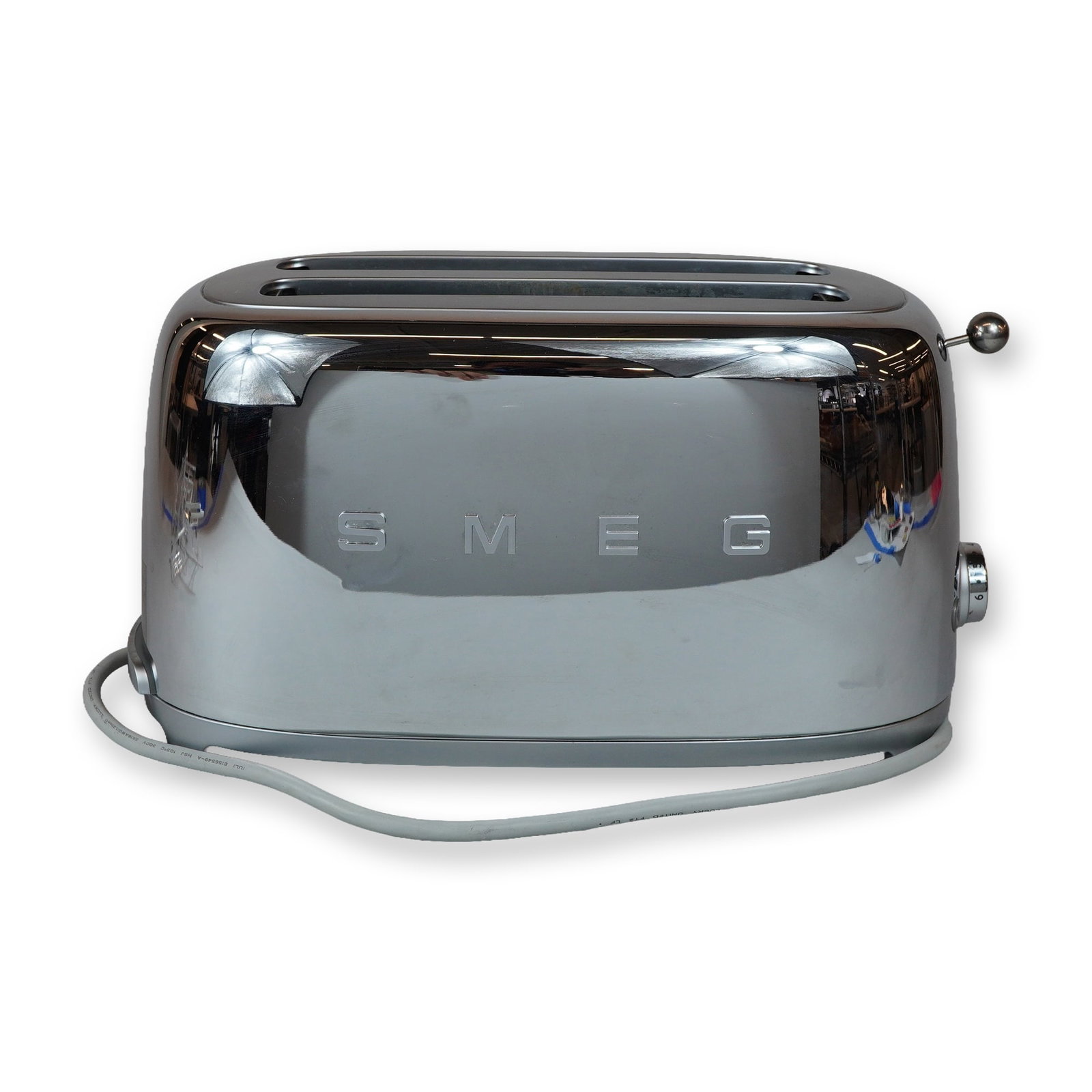 Smeg Model TSF02SSUS 4-Slice Long Slot Toaster: Smeg. 4-slice long slot toaster, model TSF02SSUS, in polished stainless steel with chrome-plated accents. Unit features two extra-wide long slots and a 1950s retro-style aesthetic. The multi-function 