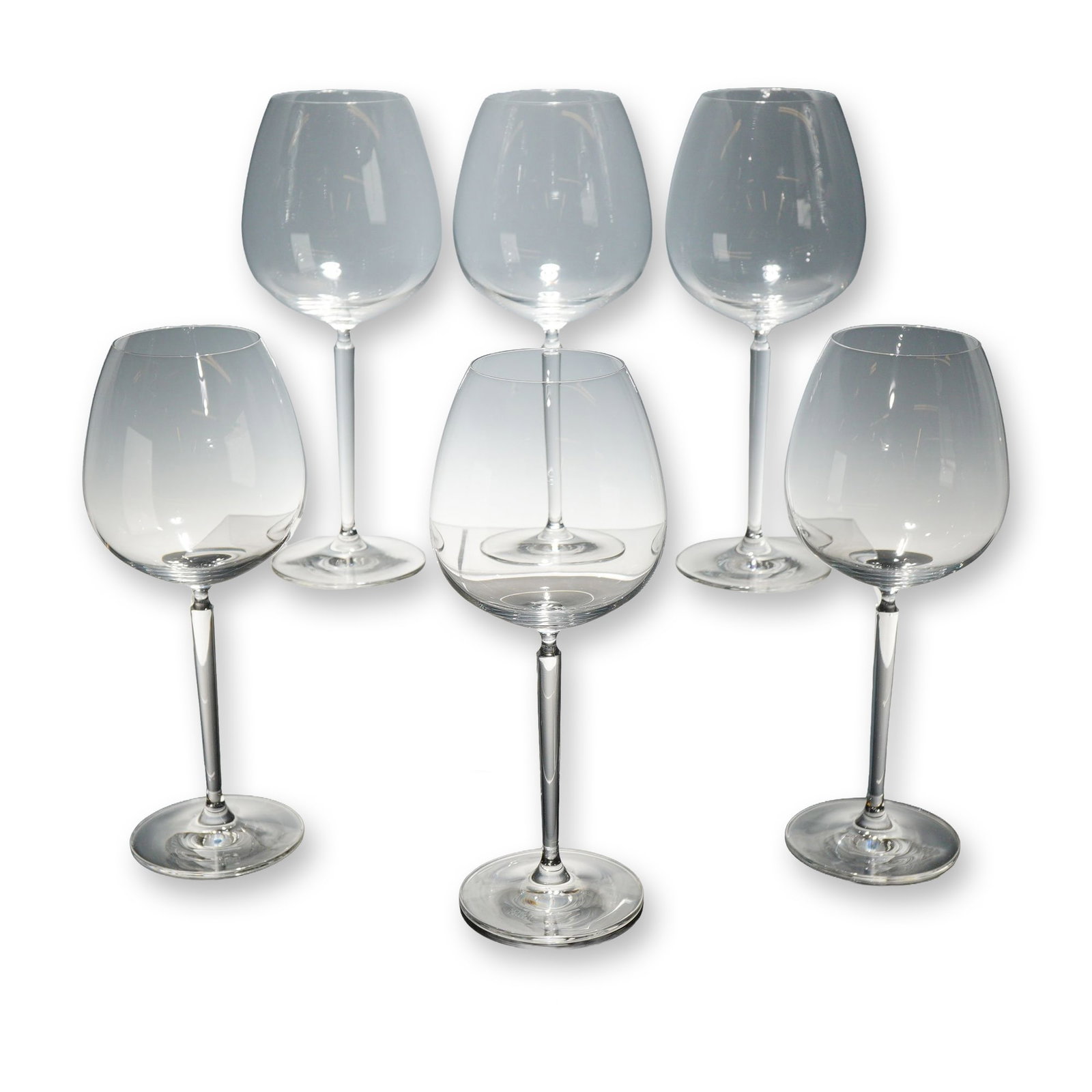 6pc Schott Zwiesel Crystal Burgundy Wine Glasses: German contemporary style. Set of six Burgundy wine glasses in clear crystal glass by Schott Zwiesel, featuring wide, bulbous red wine bowls, tall slender pulled stems with small top collars, and flat