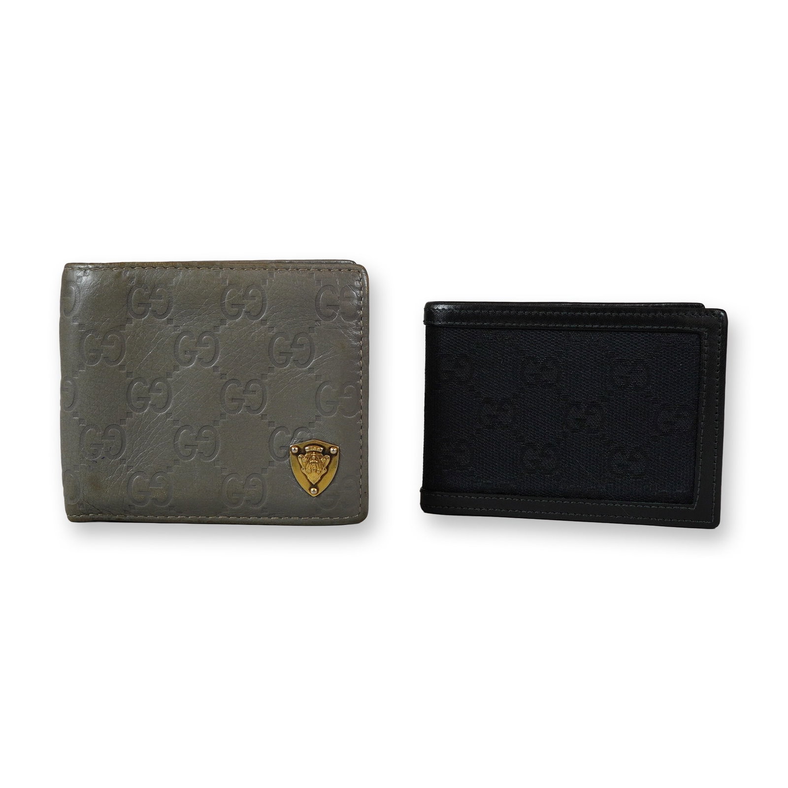 Two Gucci Leather and Canvas Bifold Wallets: Two Gucci bifold wallets. One example is crafted in grey Guccissima embossed leather, featuring a gold-tone metal shield-shaped crest on the front with embossed Gucci branding. The interior is lined i