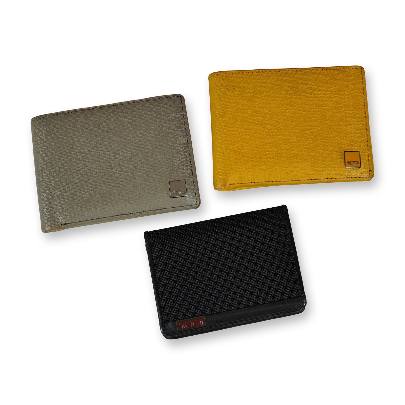 Group of Three Tumi Leather and Canvas Wallets (1 of 3)