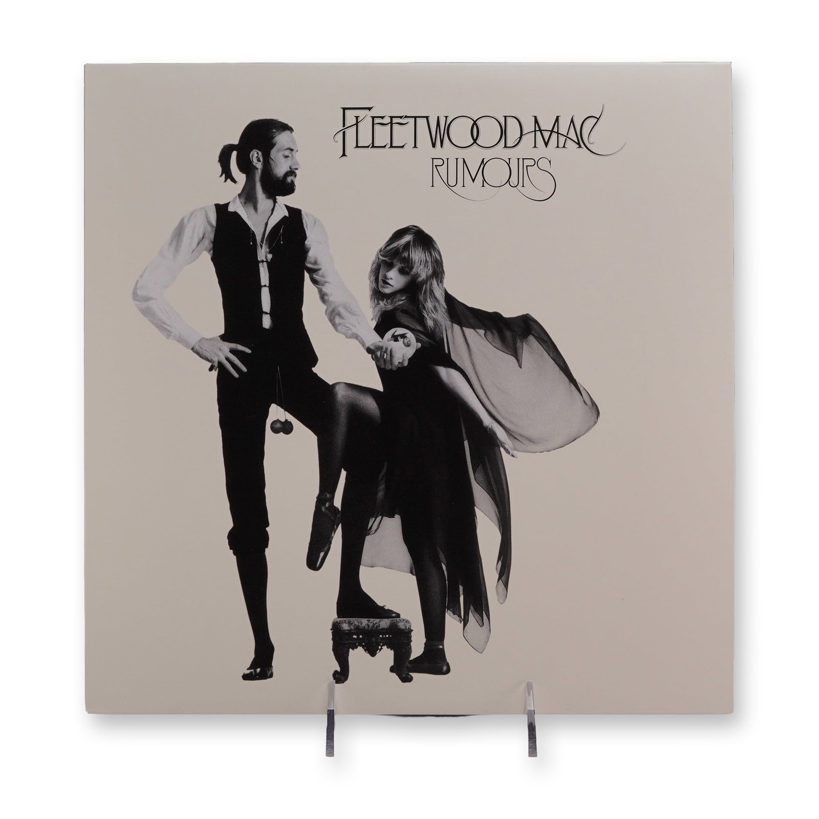 Fleetwood Mac Rumours Reissue Vinyl Record: Fleetwood Mac, 2009 Reprise reissue series. Vinyl LP record of the album Rumours, featuring updated Warner Records center labels with DTLA rim text. The lot includes the pictorial outer jacket with