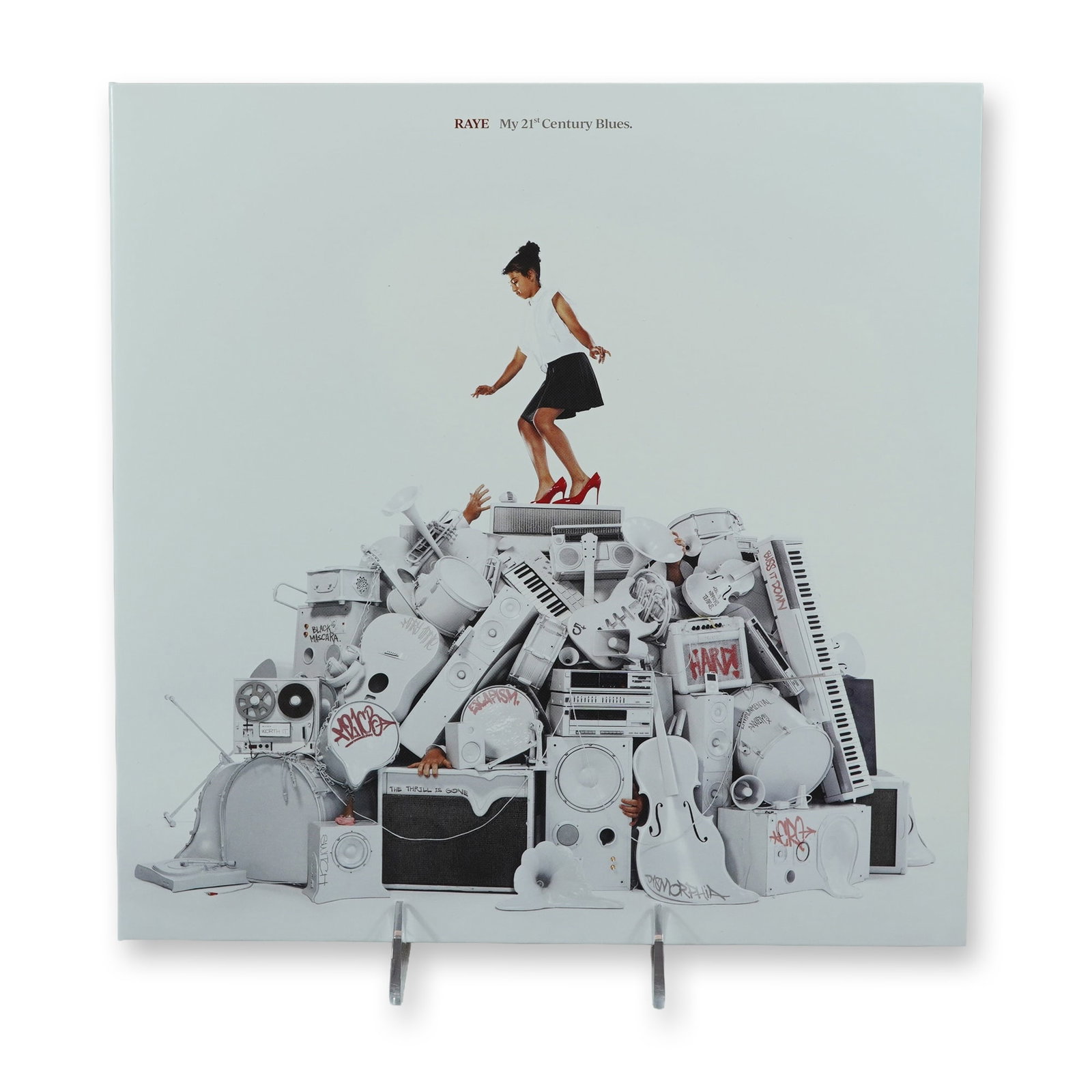 RAYE My 21st Century Blues LP Vinyl Record: RAYE (British, b. 1997). My 21st Century Blues. Debut studio album released in 2023 on black 12-inch vinyl LP. Gatefold jacket features front cover art depicting the artist on a monochromatic white