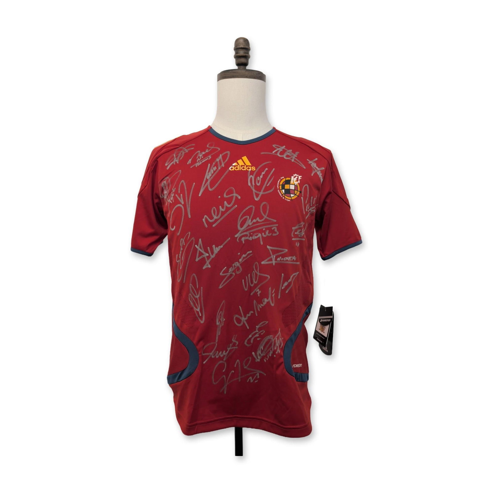 Signed 2010 Spain World Cup Adidas Soccer Jersey: Adidas Spain National Team home jersey, 2010 FIFA World Cup Formotion player-issue model in red synthetic technical fabric with navy blue trim. The front features a heat-applied Real Federacion Espano