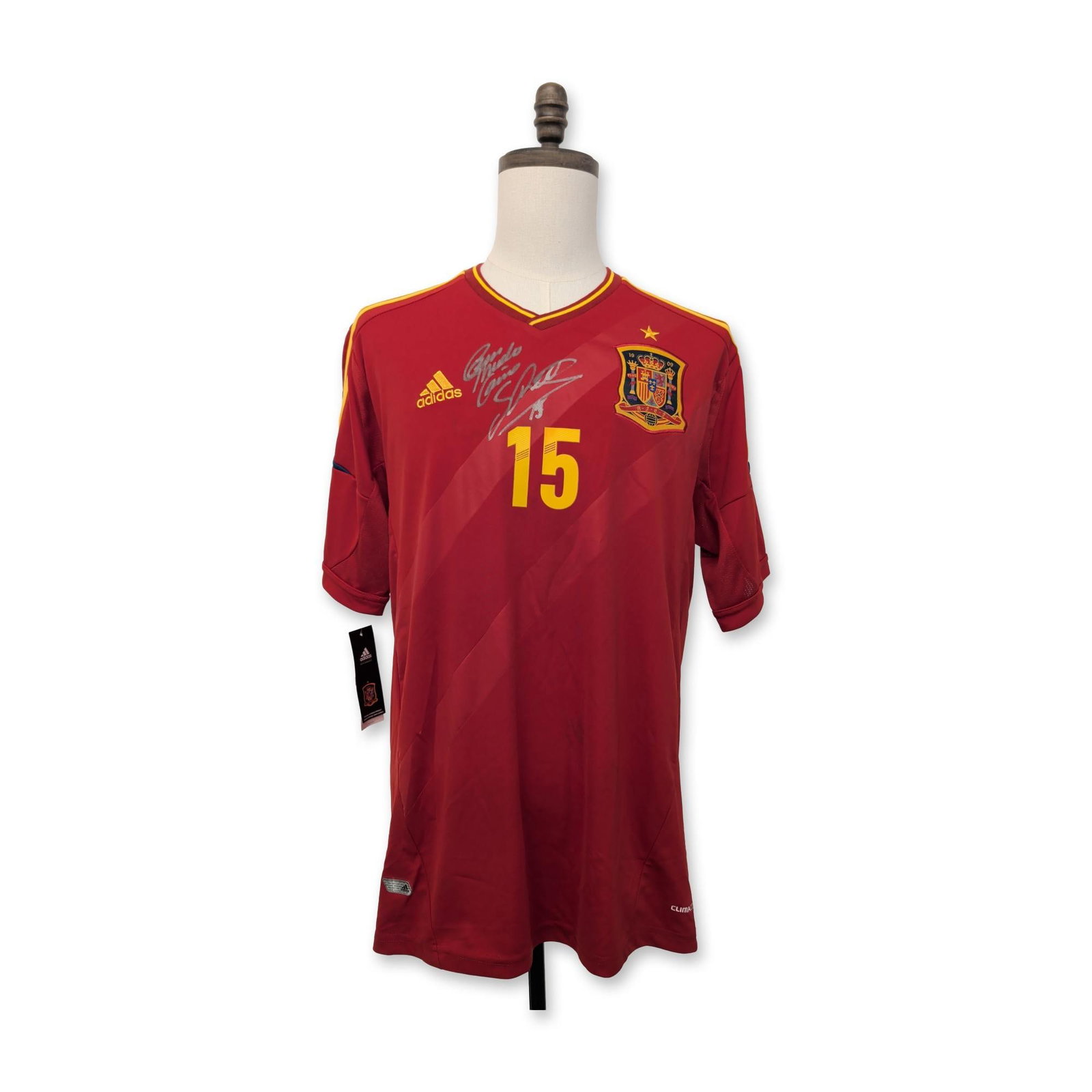 Adidas Sergio Ramos Signed Spain Euro 2012 Soccer Jersey: Adidas Spain National Team home soccer jersey, produced for the Euro 2012 tournament. The short-sleeved red jersey features yellow trim and the Spanish Football Federation crest with a single star abo