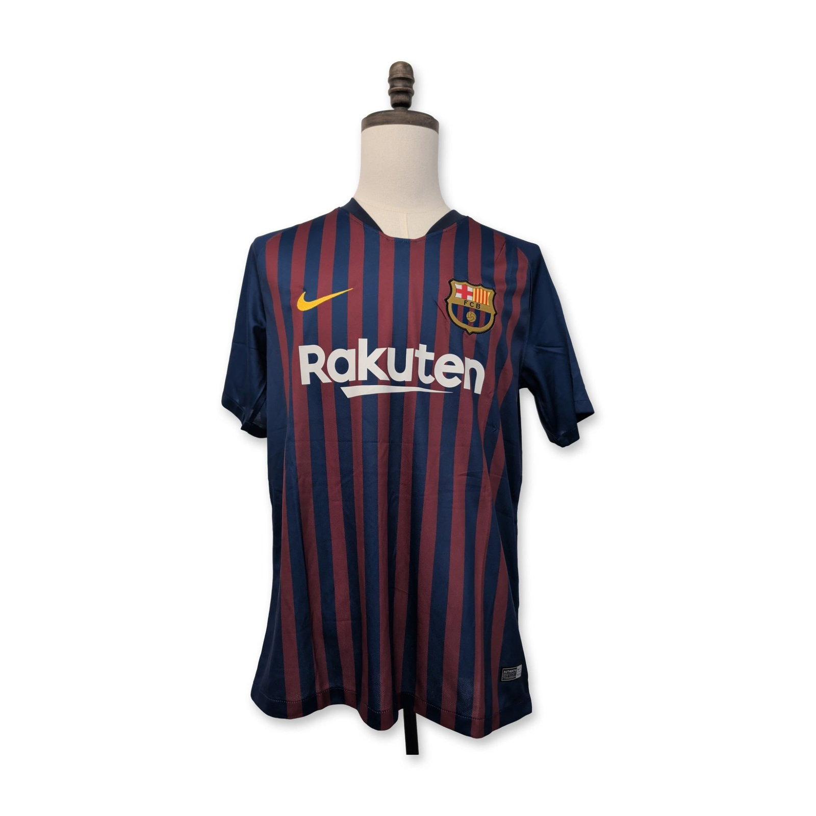 Lionel Messi 2018-19 Barcelona Soccer Jersey, Signed: Nike FC Barcelona 2018-2019 season home jersey featuring the traditional blue and garnet vertical stripes. Short-sleeved polyester construction with an embroidered club crest and heat-pressed yellow N