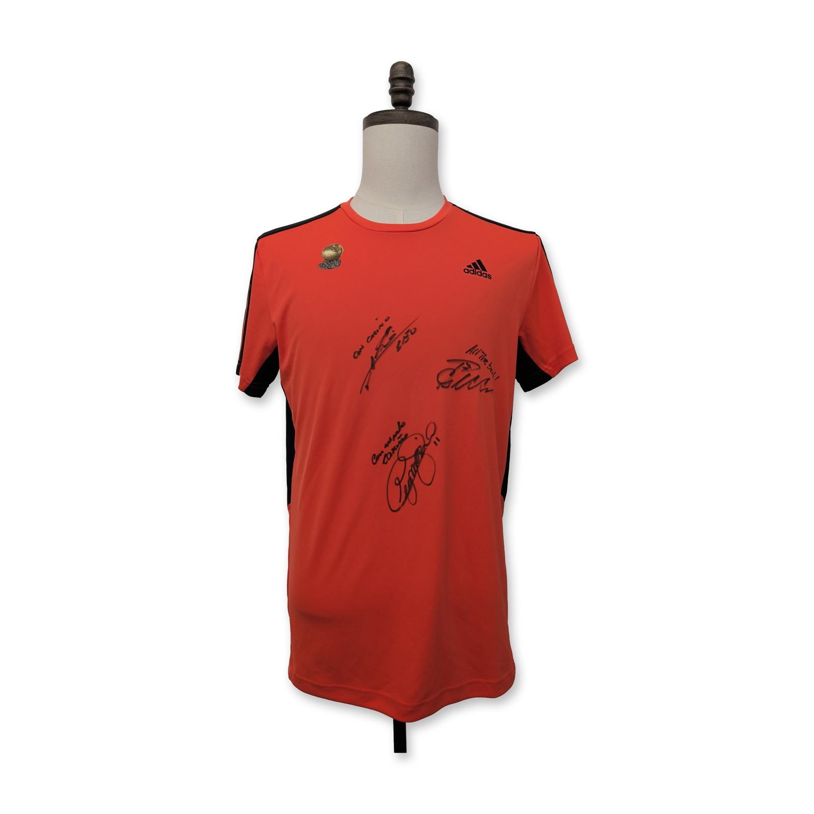 2013 Ballon d'Or Signed Commemorative Soccer Jersey, Messi, Cristiano, Ribery.: Adidas commemorative football jersey produced for the 2013 FIFA Ballon d'Or. The shirt is constructed in bright orange fabric with black side panels and the signature Adidas three-stripe motif on the 