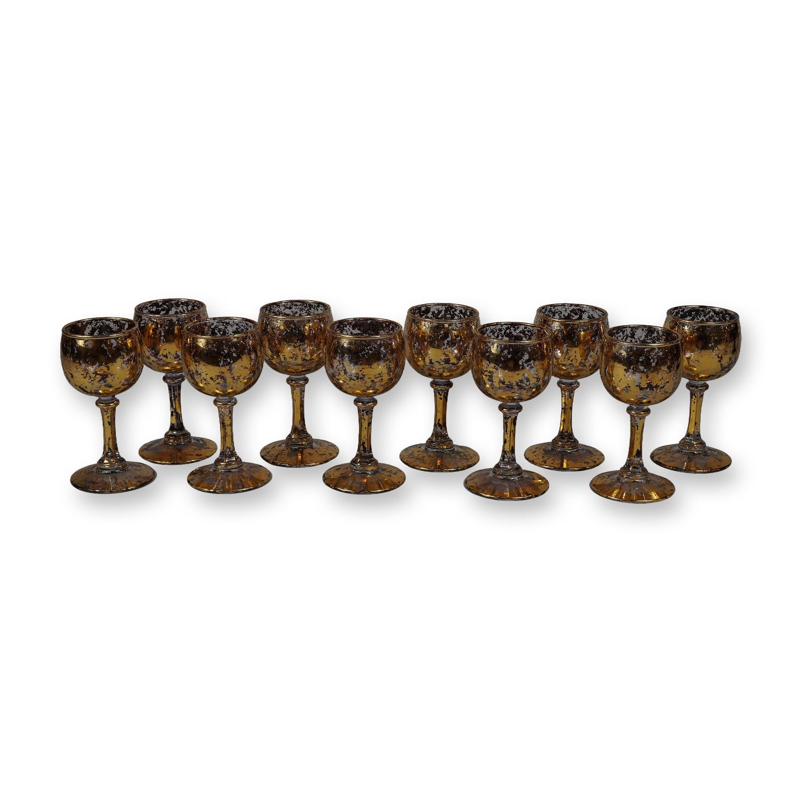 10pc Set of Vintage Gold Confetti Glass Cordial Stemware: A set of ten (10) vintage cordial glasses. These items feature a gold confetti decoration, characterized by a heavily mottled and spattered metallic finish in combined gold and silver tones over