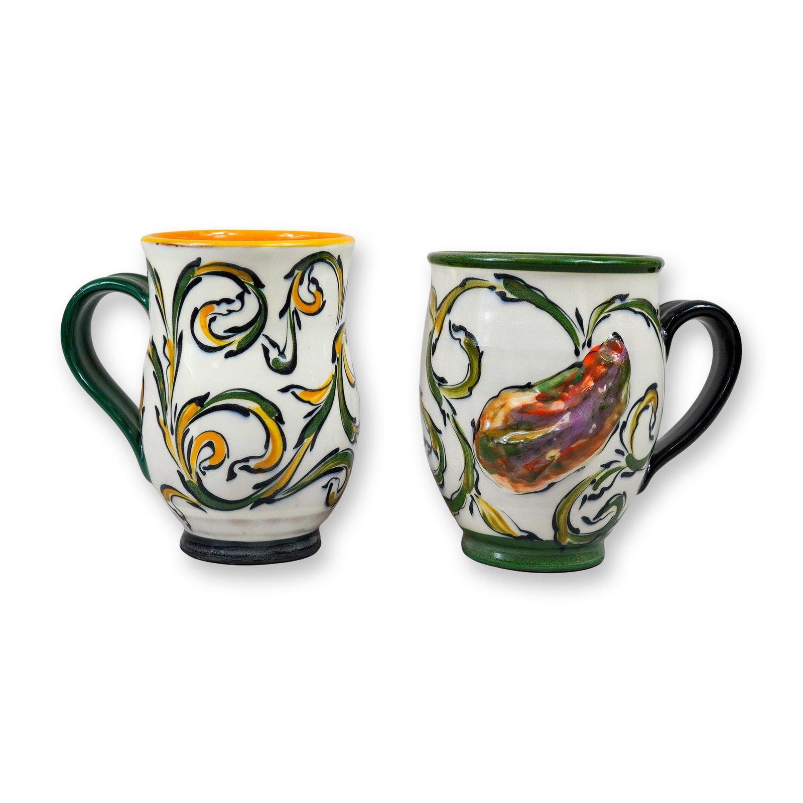 2pc M & C Cauza Hand-Painted Majolica Style Earthenware Mugs: This pair of hand-decorated earthenware mugs is crafted in a Mediterranean majolica style, featuring the traditional Ricco Deruta pattern of scrolling acanthus leaves. Both pieces are finished with a