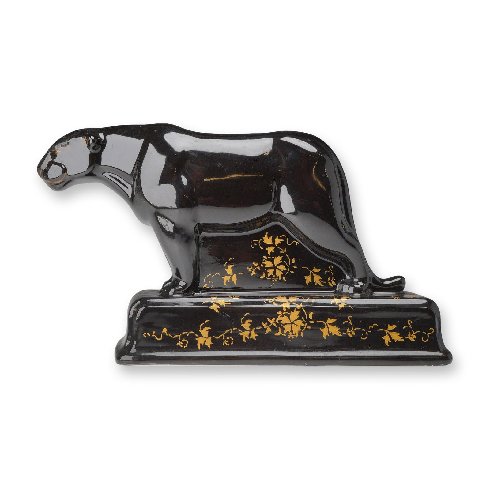 Wedgwood Barlaston Collection Bone China Black Gilt Figurine, Panther: A Wedgwood bone china figurine of a panther from the Barlaston Collection. The stylized animal is modeled in a prowling posture atop an integral rectangular base. The figurine is finished in a high-gl