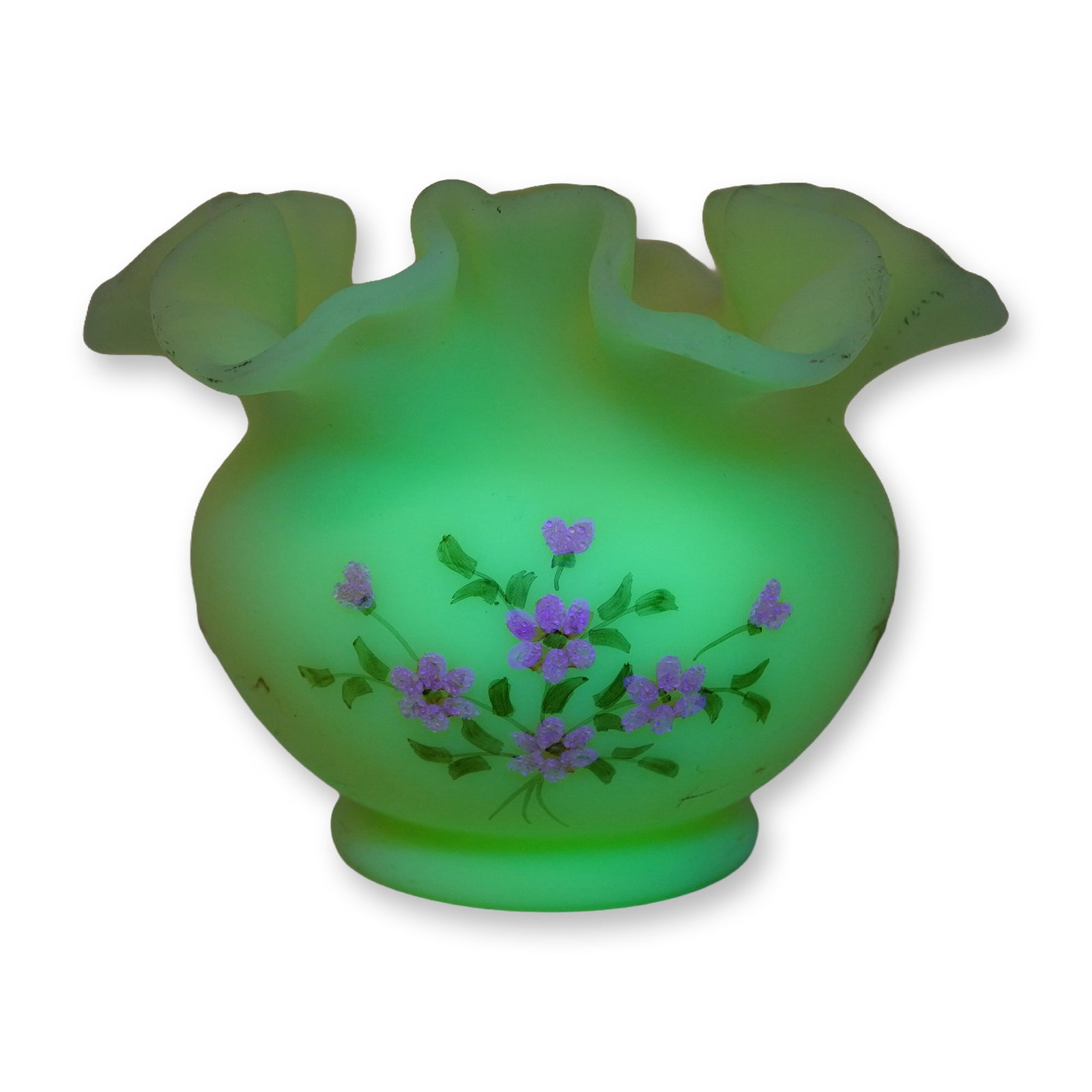 Fenton Signed Uranium Custard Glass Miniature Ruffled Vase: Fenton Art Glass miniature ruffled vase in uranium custard glass. The opaque creamy-yellow vessel features a hand-ruffled rim and bulbous body decorated with hand-painted floral motifs. Blossoms are r