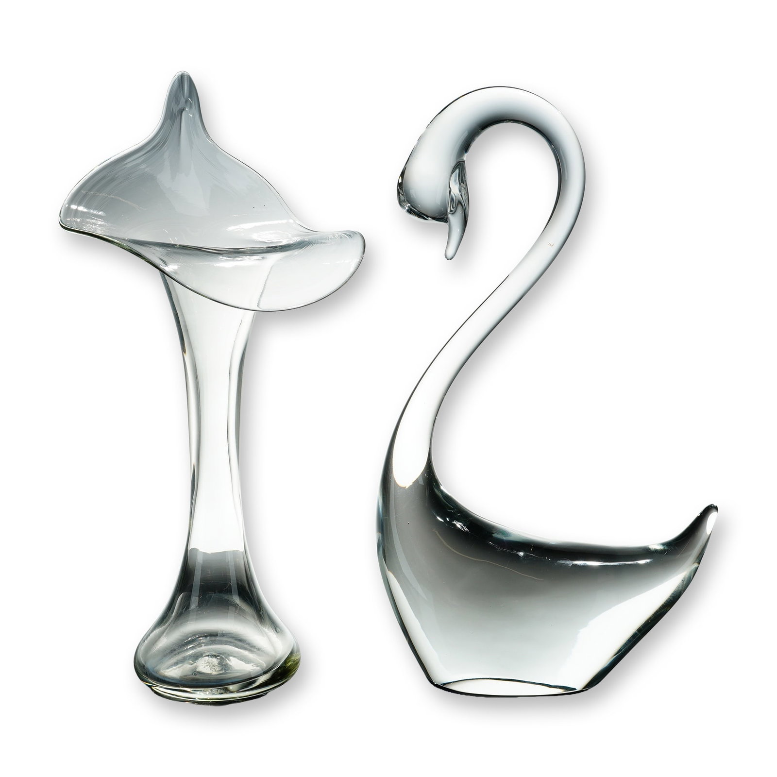 2pc Art Glass Swan and Vase: Contemporary clear art glass. Group of two pieces including a stylized swan figurine and a jack-in-the-pulpit form vase. The swan features a solid glass body and curved neck, with an incised