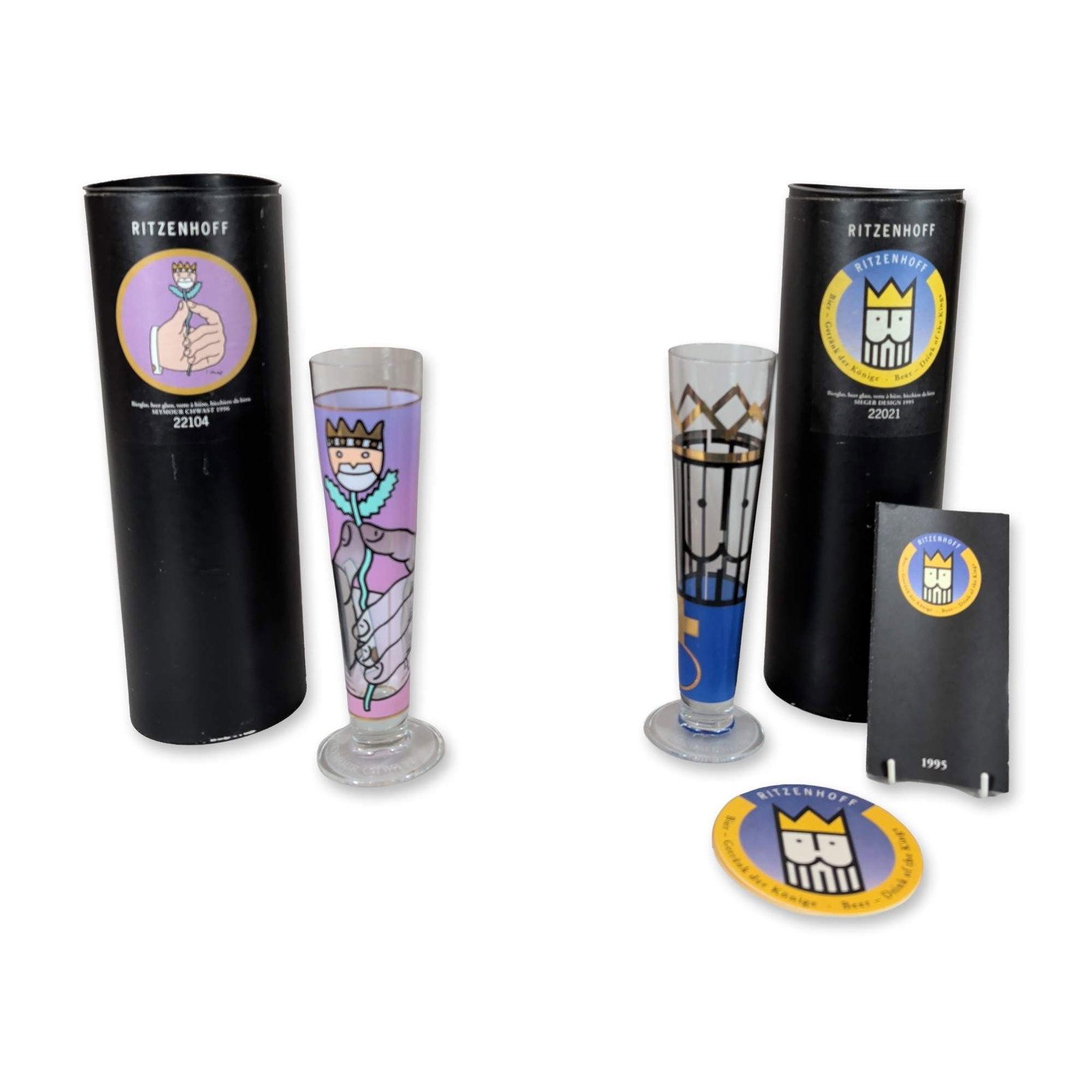 Two Ritzenhoff Artist Series Glass Pilsner Flutes: Two designer pilsner beer glasses from the Ritzenhoff collection. One glass features a 1993 design by Michael Sieger for Sieger Design, model 22021, with geometric and architectural crown motifs in