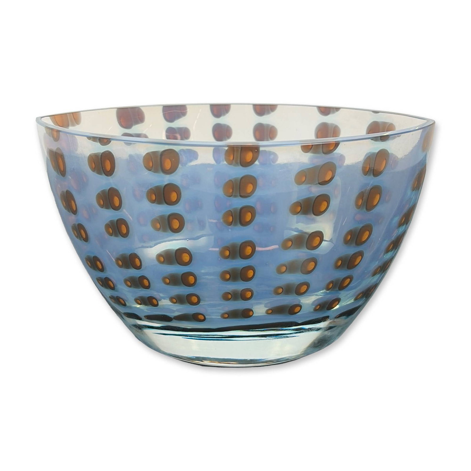 Evolution by Waterford Opal and Amber Art Glass Bowl: Evolution by Waterford art glass bowl in iridescent opal blue glass, featuring horizontal rows of applied amber-toned spots with dark centers. The base is decorated with a dark-toned trailing spiral r